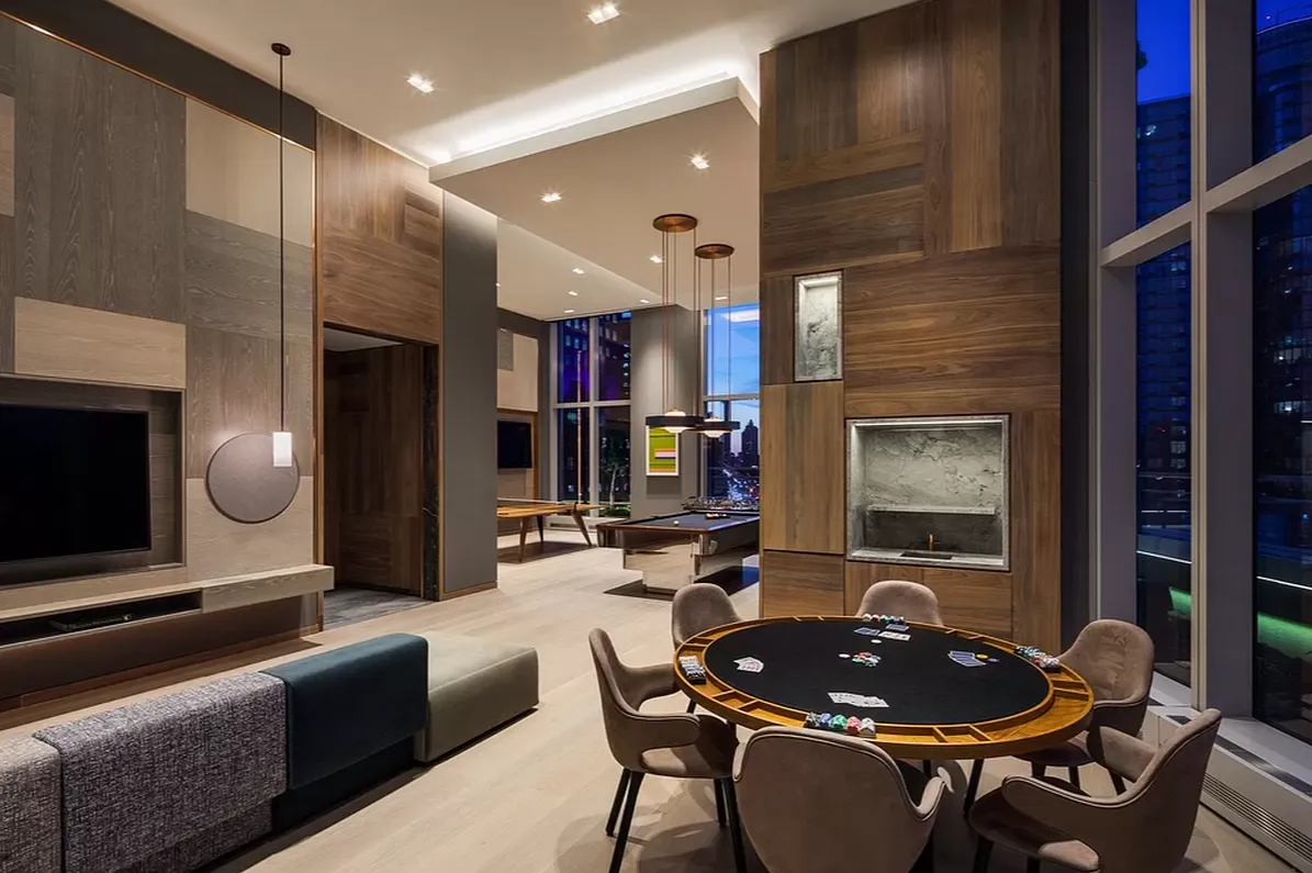 a kitchen with a table chairs and a stove