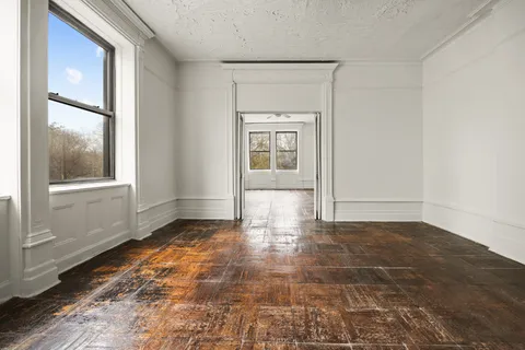 a view of an empty room and window