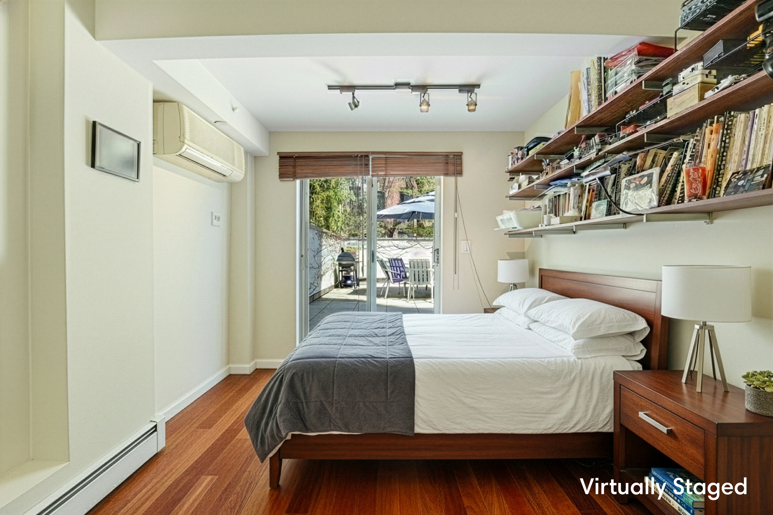 335 Warren Street, Unit 102 Brooklyn, NY 11201 - Photo 6 of 20 a bedroom with a bed and a large window