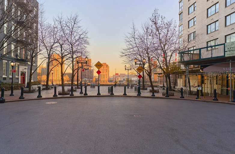 530 East 72nd Street, Unit 4F Manhattan, NY 10021 - Photo 14 of 23 a view of a building with a street