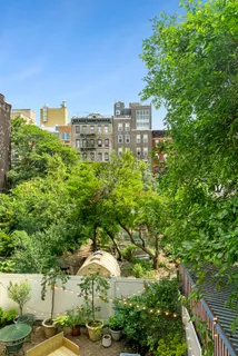a view of a city with tall buildings