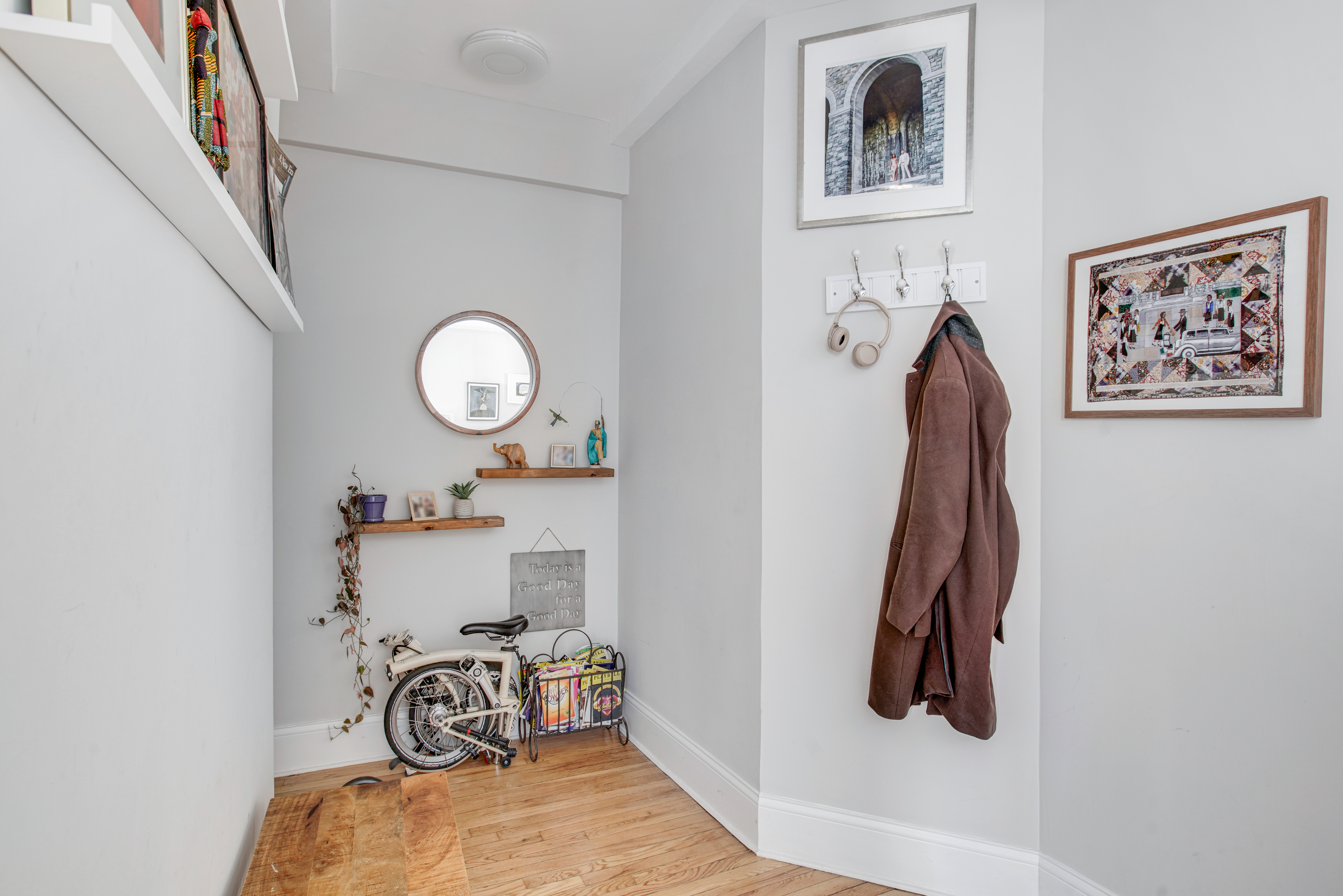 165 West 91st Street, Unit 15B Manhattan, NY 10024 - Photo 13 of 24 a view of a room with rack and furniture