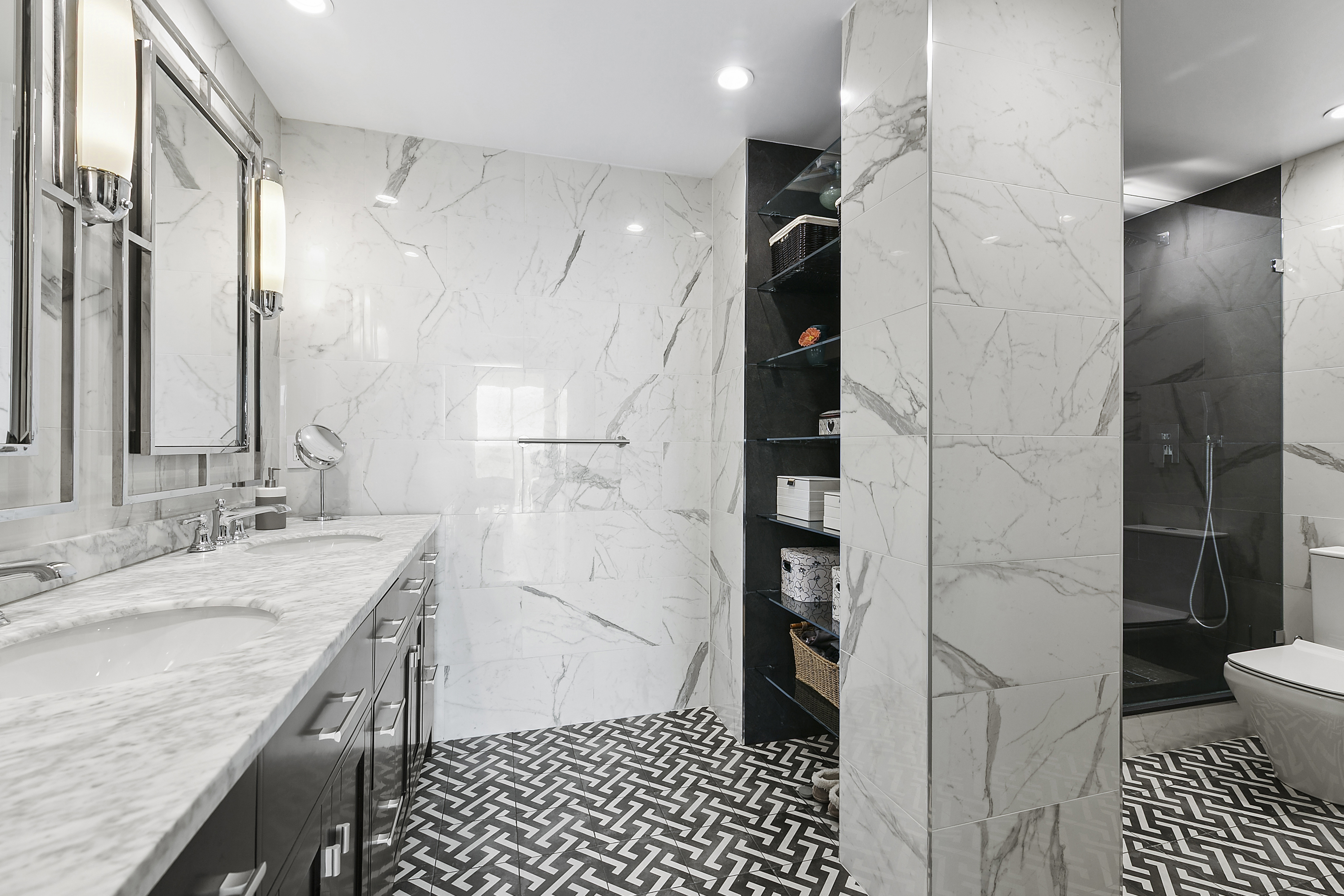 21 South End Avenue, Unit 402 Manhattan, NY 10280 - Photo 6 of 13 a bathroom with a granite countertop sink a toilet and shower