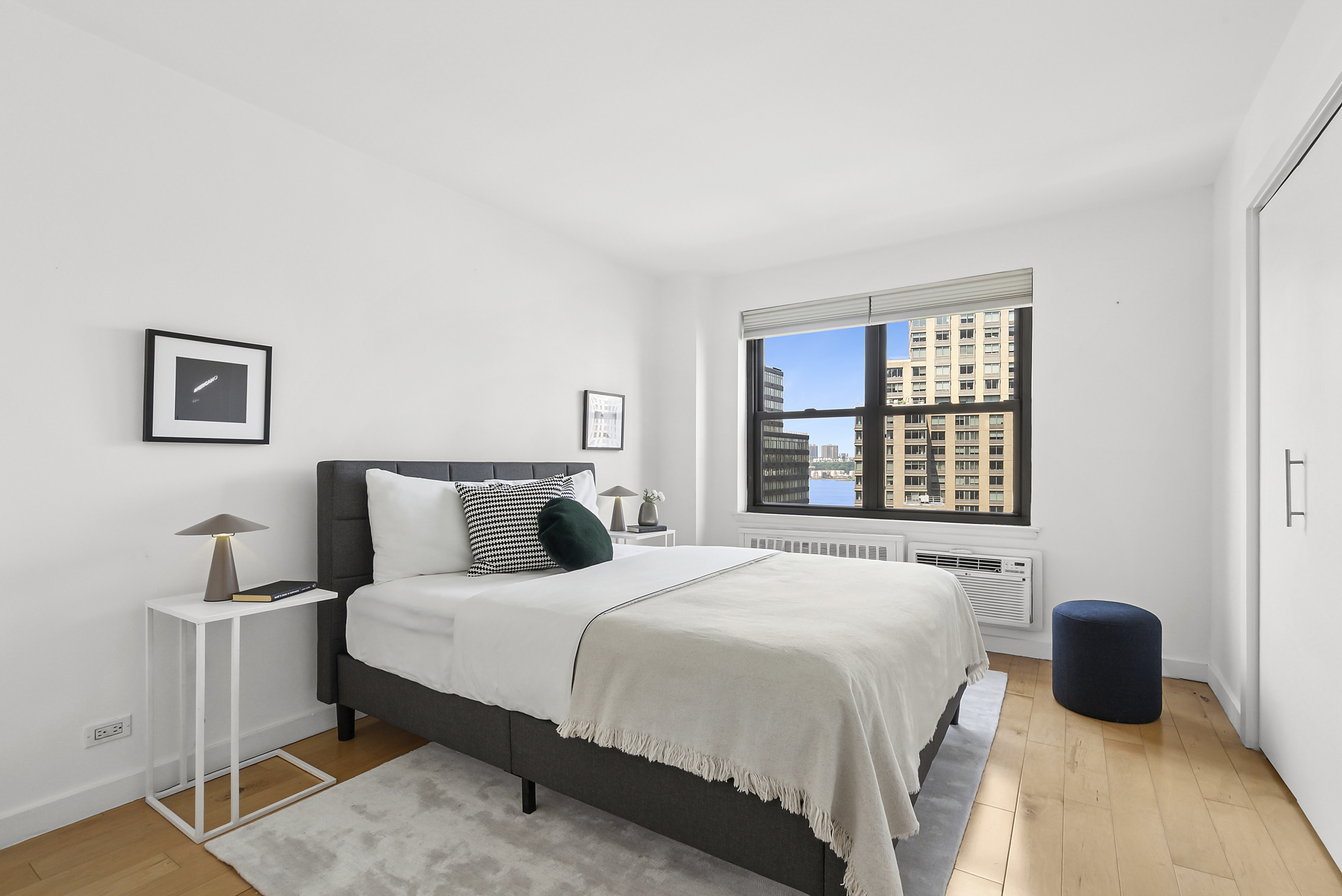 165 West End Avenue, Unit 11A Manhattan, NY 10023 - Photo 3 of 5 a bedroom with a bed and a window