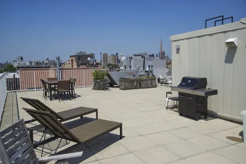 a view of a terrace with furniture