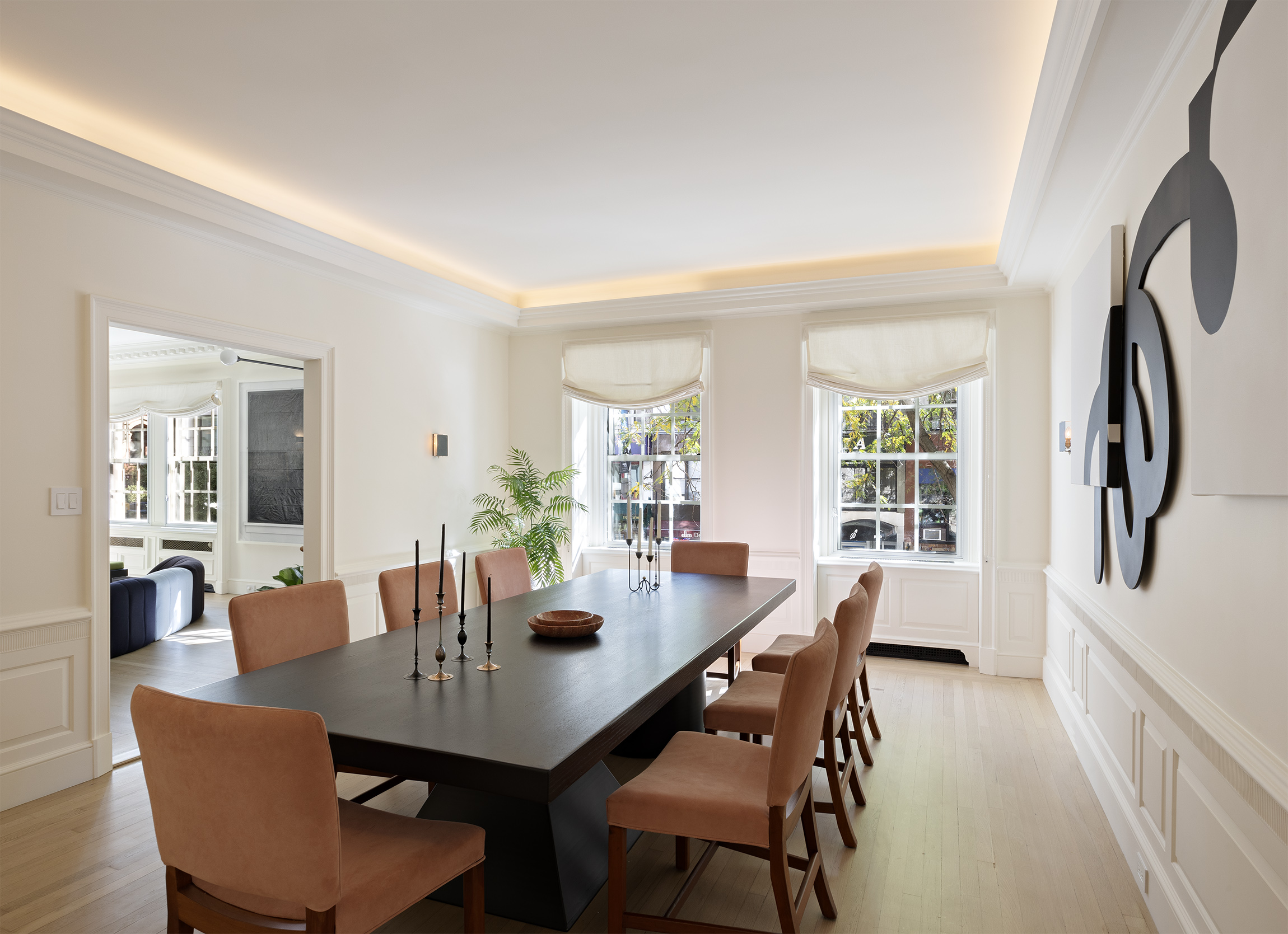 133 East 64th Street, Unit 2B Manhattan, NY 10065 - Photo 4 of 14 a view of a dining room with furniture and window