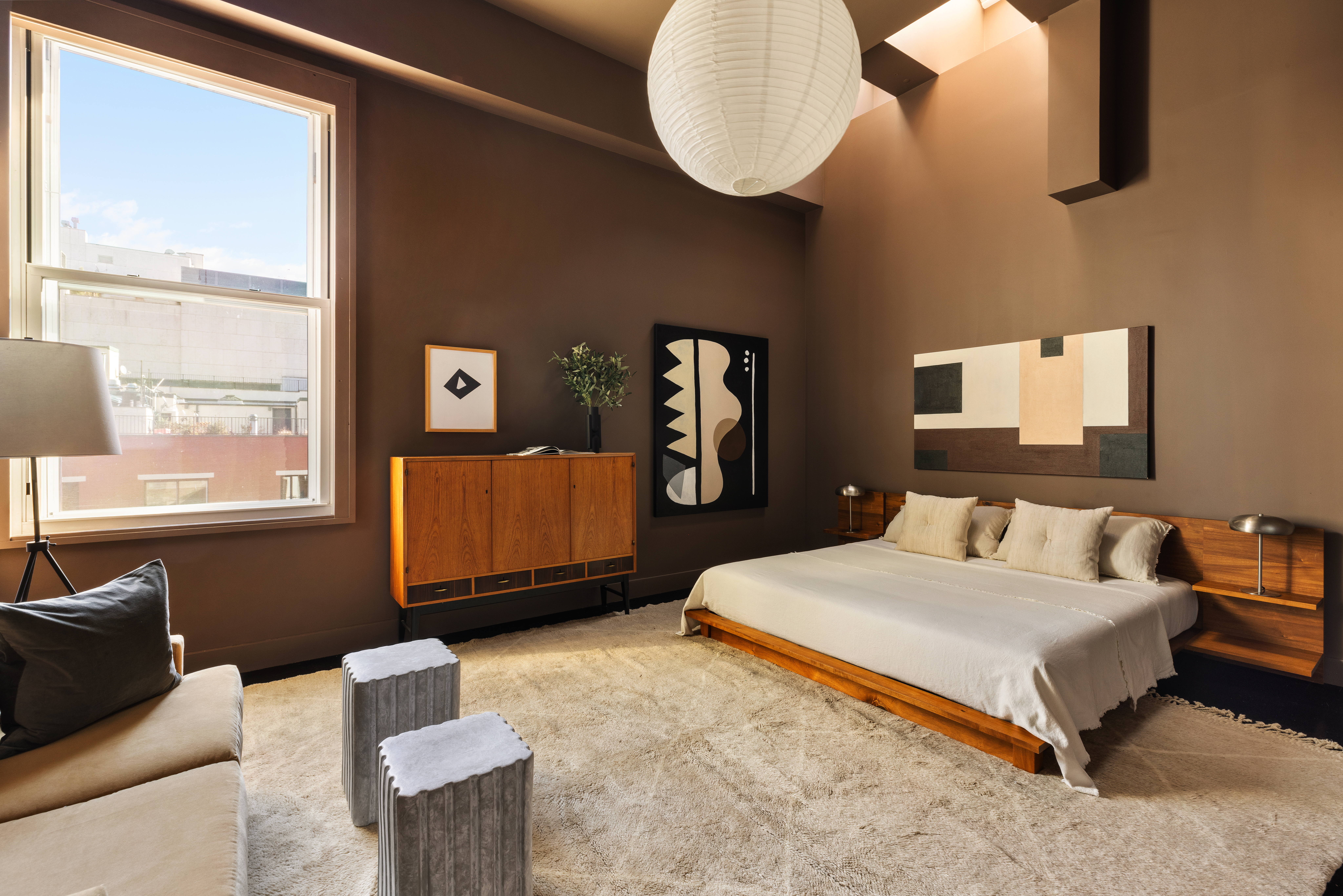 7 Bond Street, Unit PHAB Manhattan, NY 10012 - Photo 9 of 20 a bedroom with a bed and window