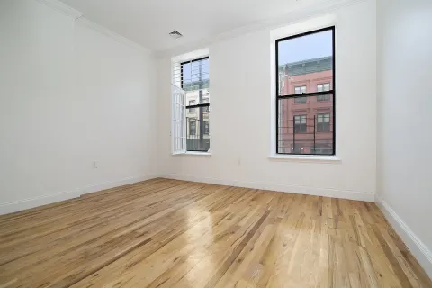 an empty room with windows