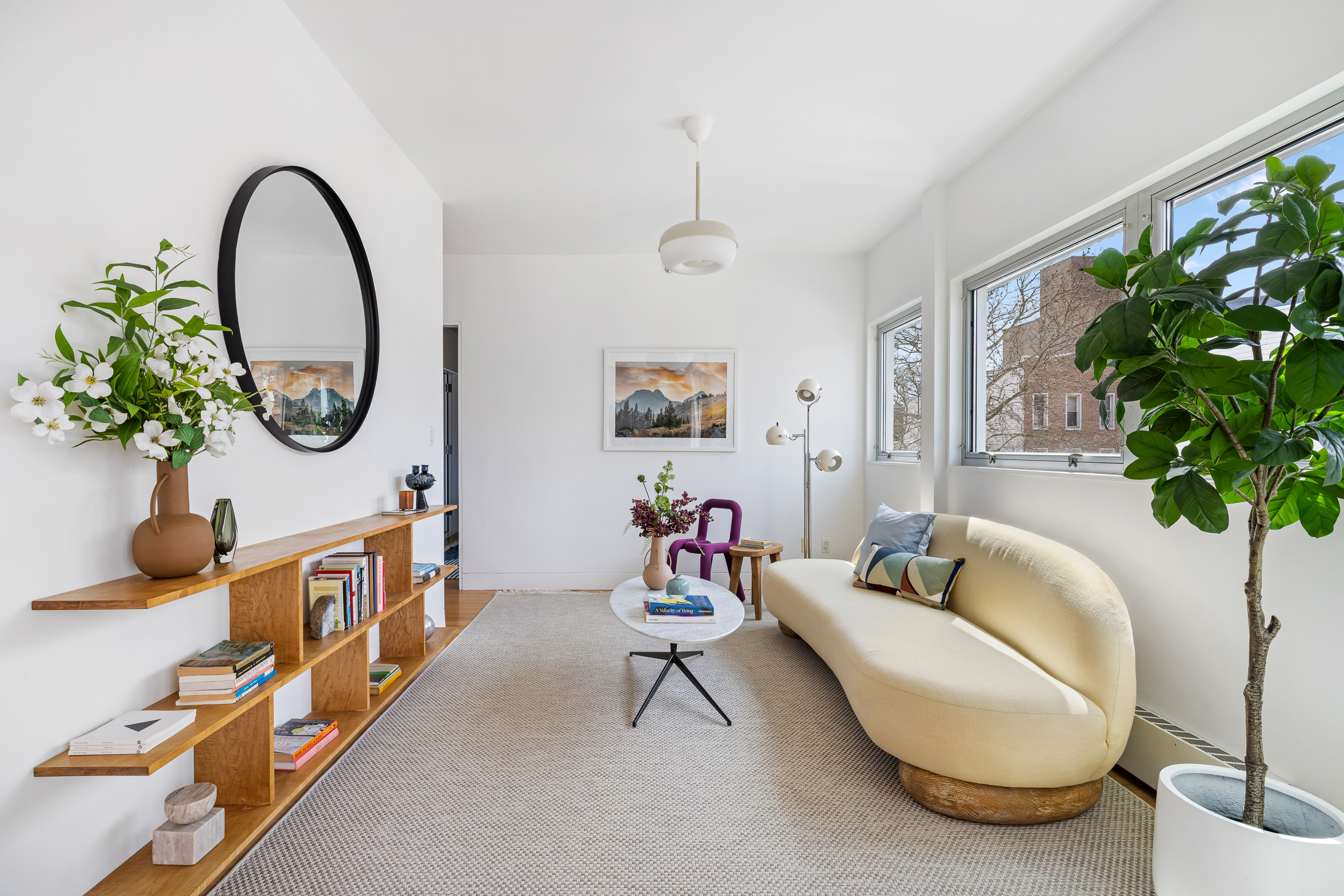 361 Manhattan Avenue, Unit 3AB Brooklyn, NY 11211 - Photo 6 of 21 a living room with furniture flowerpot and a potted plant