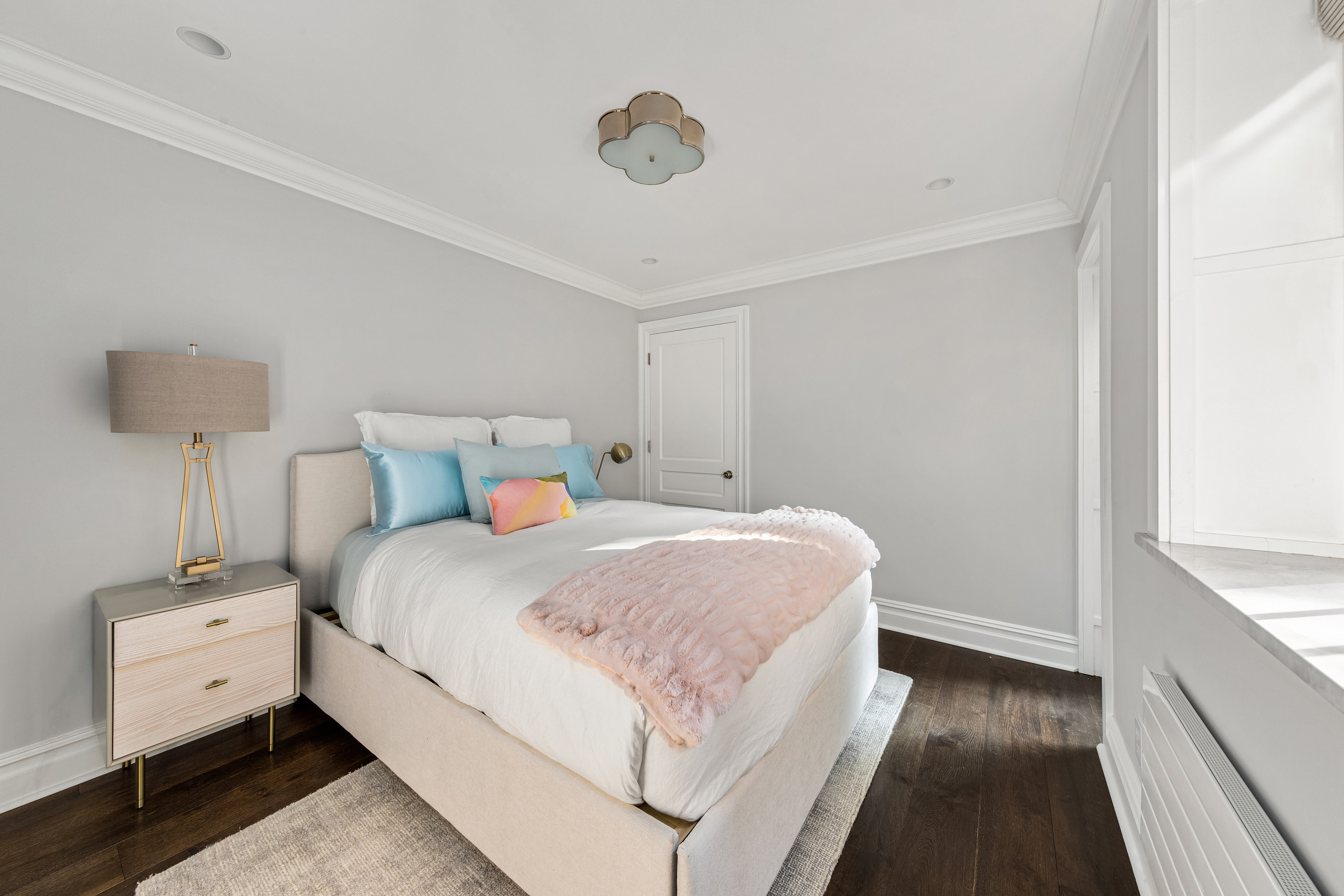 110 West 81st Street Manhattan, NY 10024 - Photo 14 of 30 a bedroom with a bed and a night stand