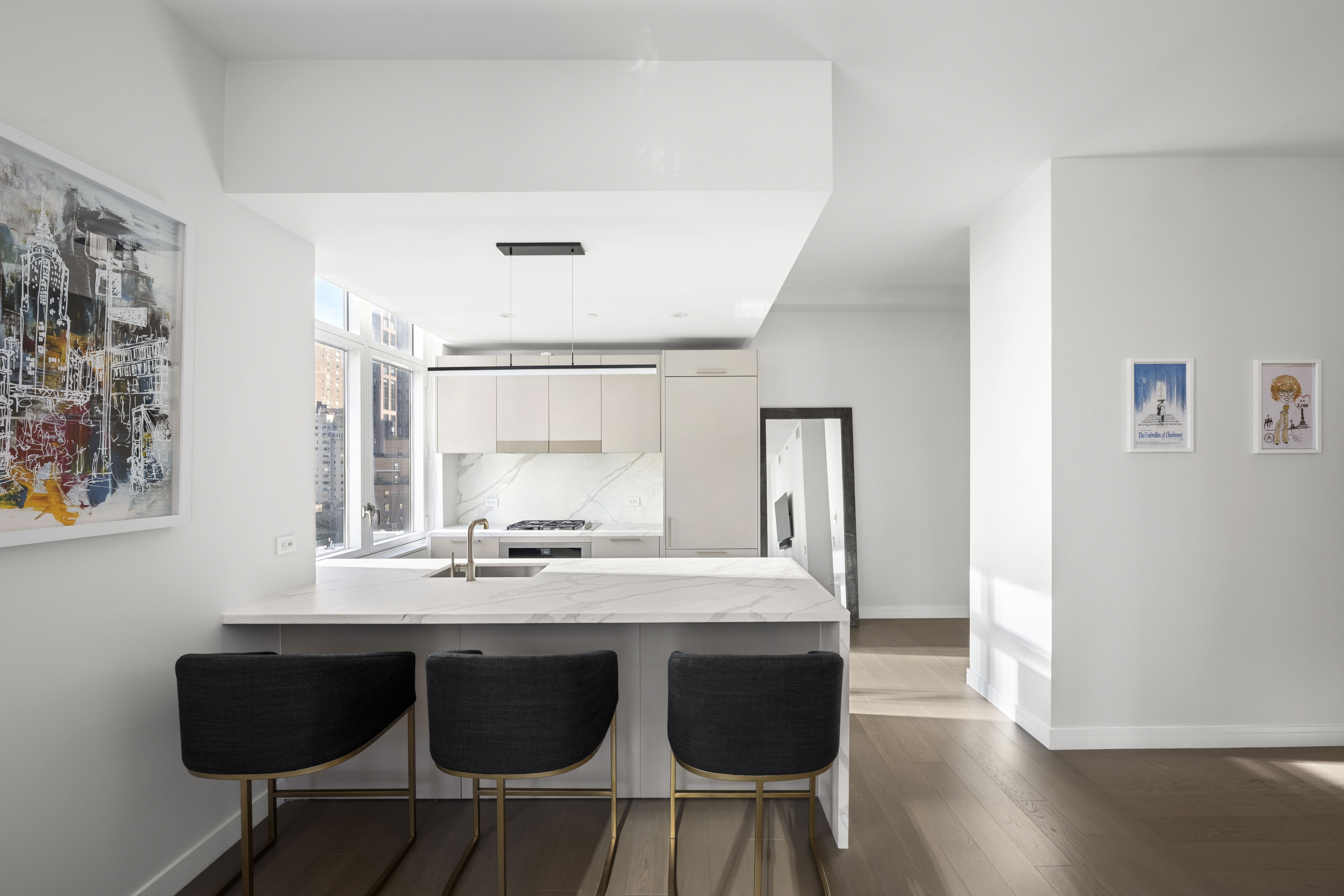 305 East 51st Street, Unit 11D Manhattan, NY 10022 - Photo 4 of 18 a dining room with a table and chairs