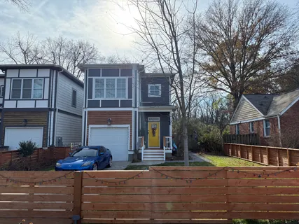 a sign that is on the wall of the building