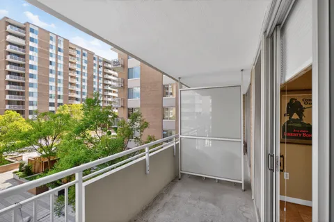 a view of balcony with stainless steel appliances