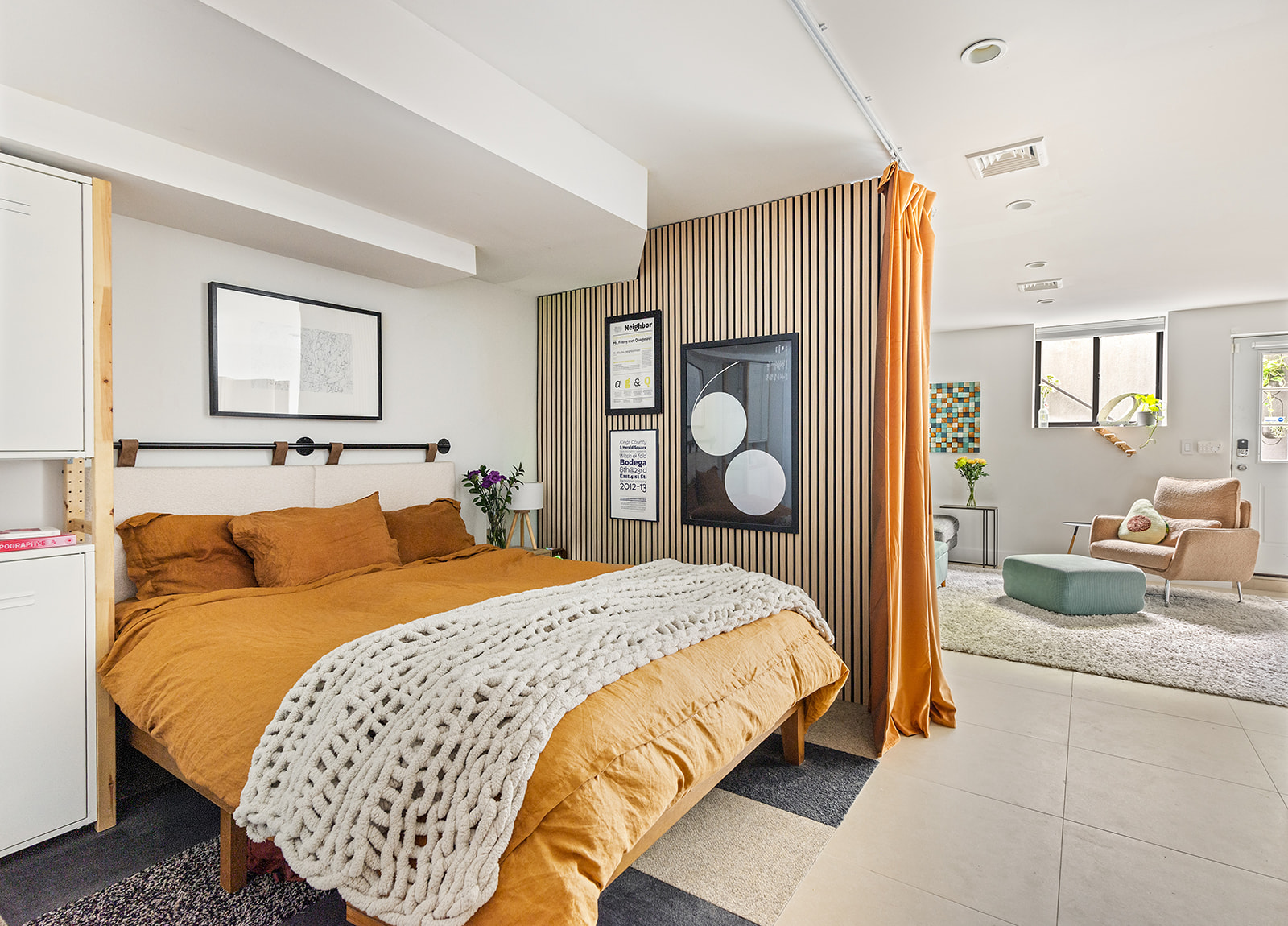 495 Rutland Road, Unit 1 Brooklyn, NY 11203 - Photo 10 of 13 a bedroom with a bed and dresser with mirror