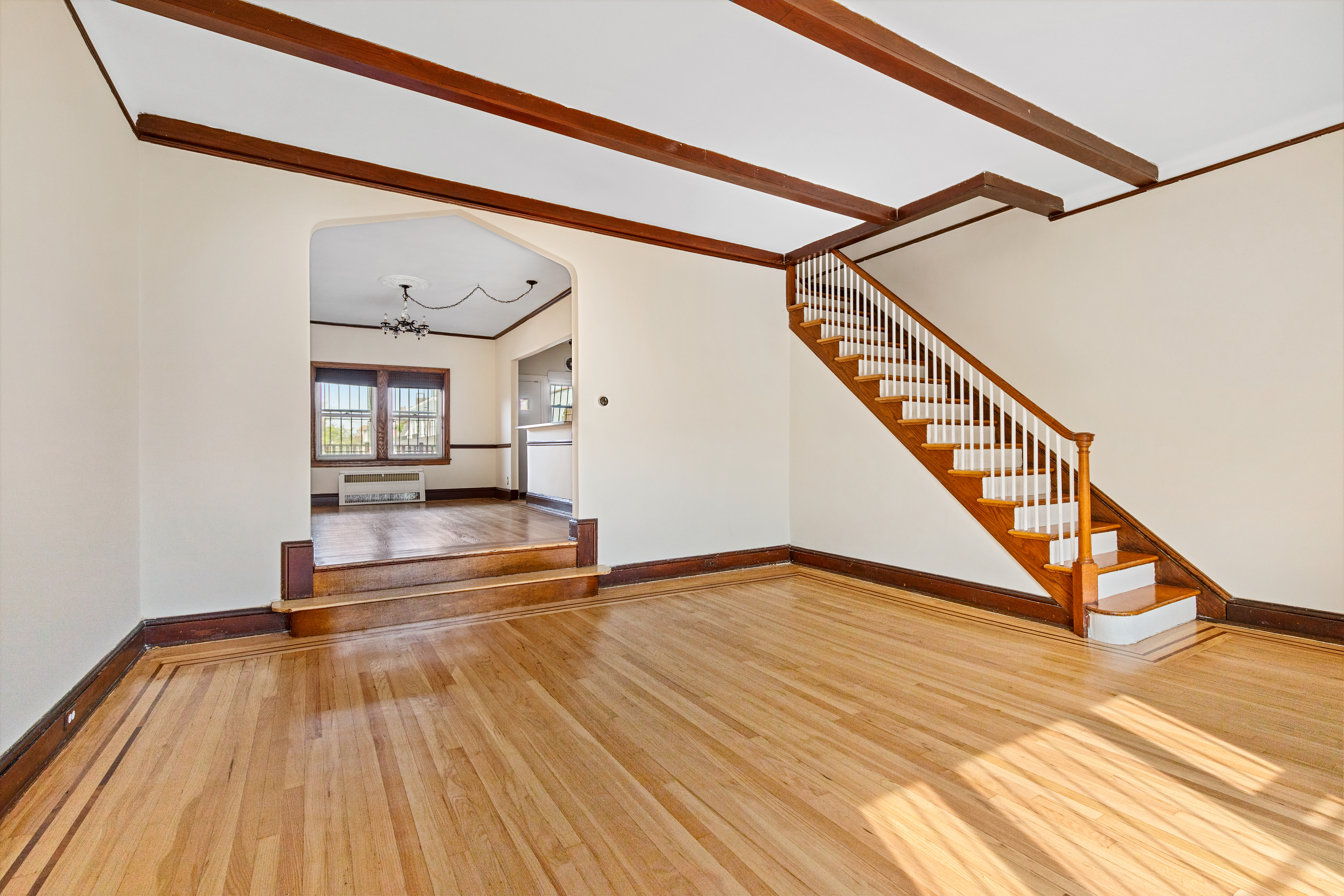 32 Tudor Terrace Brooklyn, NY 11224 - Photo 2 of 15 a view of an entryway with wooden floor and stairs