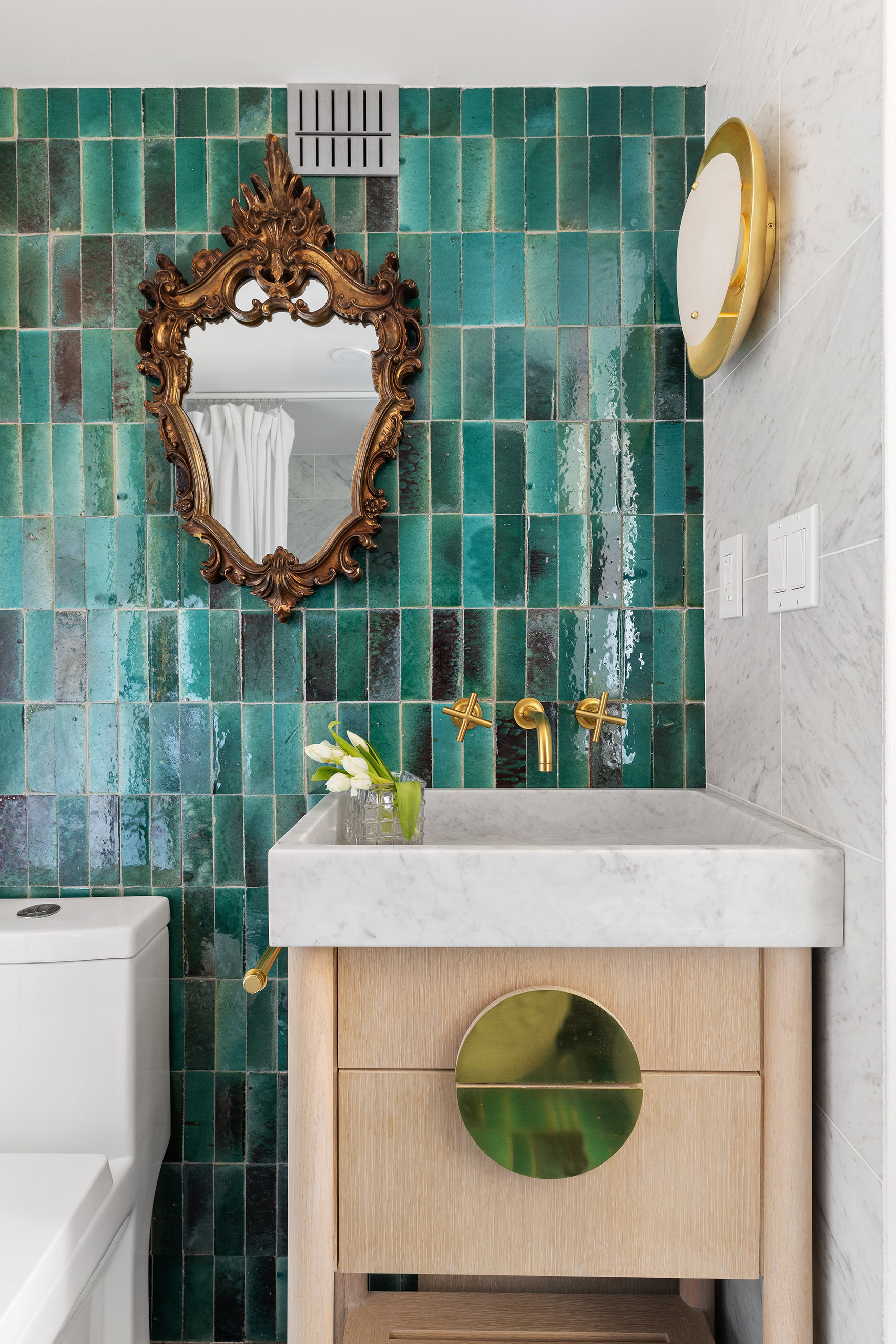 175 East 62nd Street, Unit PHA Manhattan, NY 10065 - Photo 9 of 18 a bathroom with a sink a mirror and shower