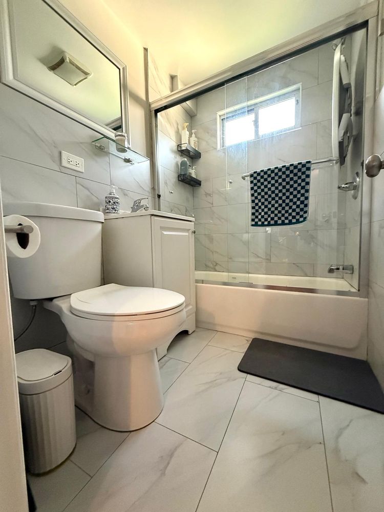 269 Ainslie Street Brooklyn, NY 11211 - Photo 16 of 22 a bathroom with a toilet and a shower