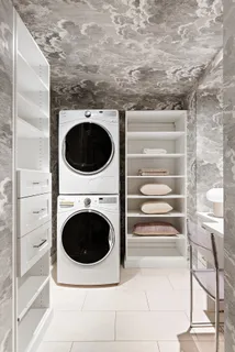 a view of washer and dryer with washer in it