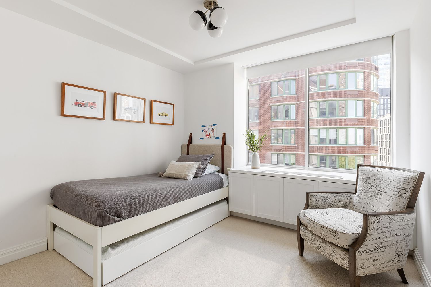 303 Greenwich Street, Unit 8DE Manhattan, NY 10013 - Photo 13 of 20 a bedroom with a bed and a couch
