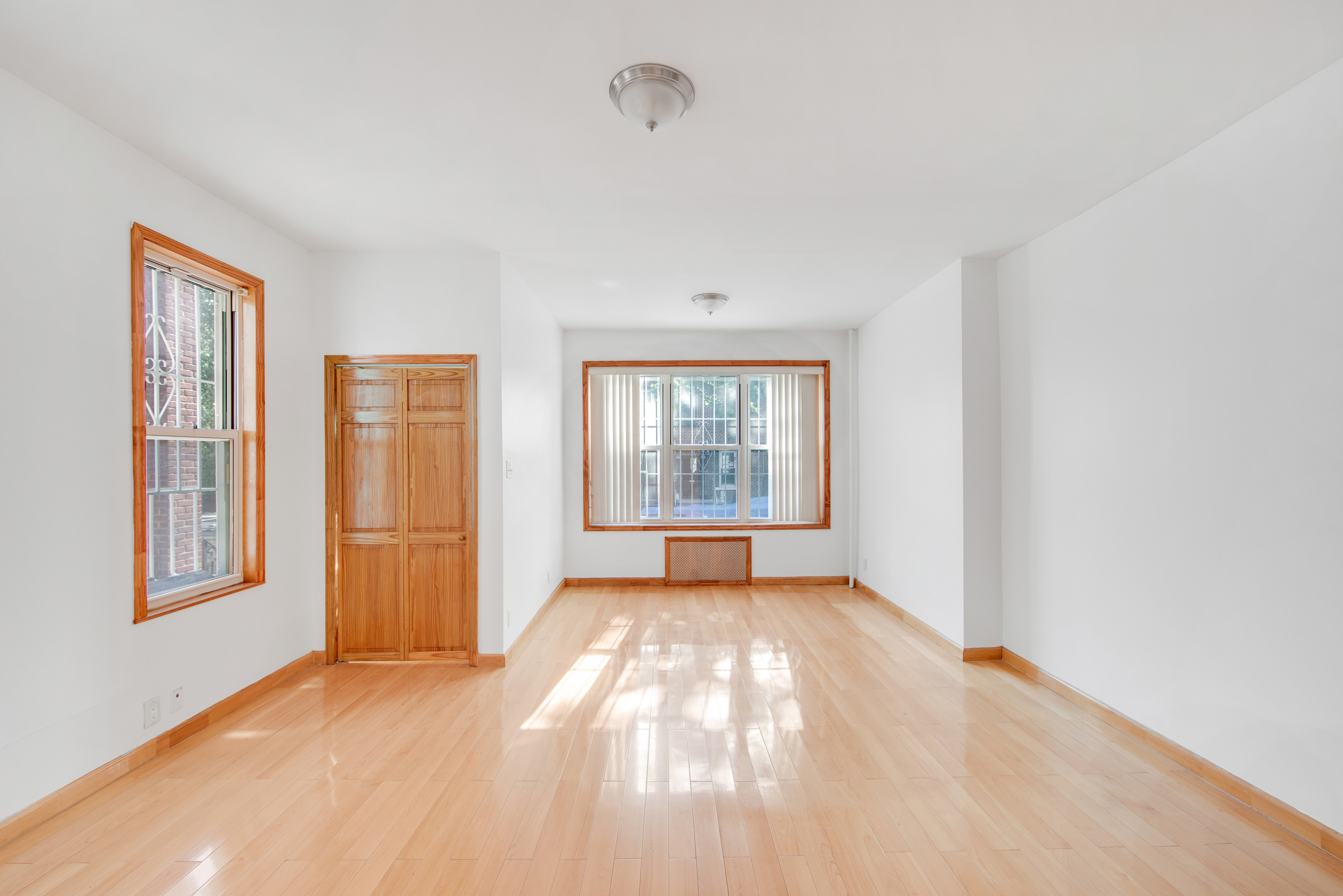 1759 West 1st Street Brooklyn, NY 11223 - Photo 2 of 21 a view of an empty room with a window
