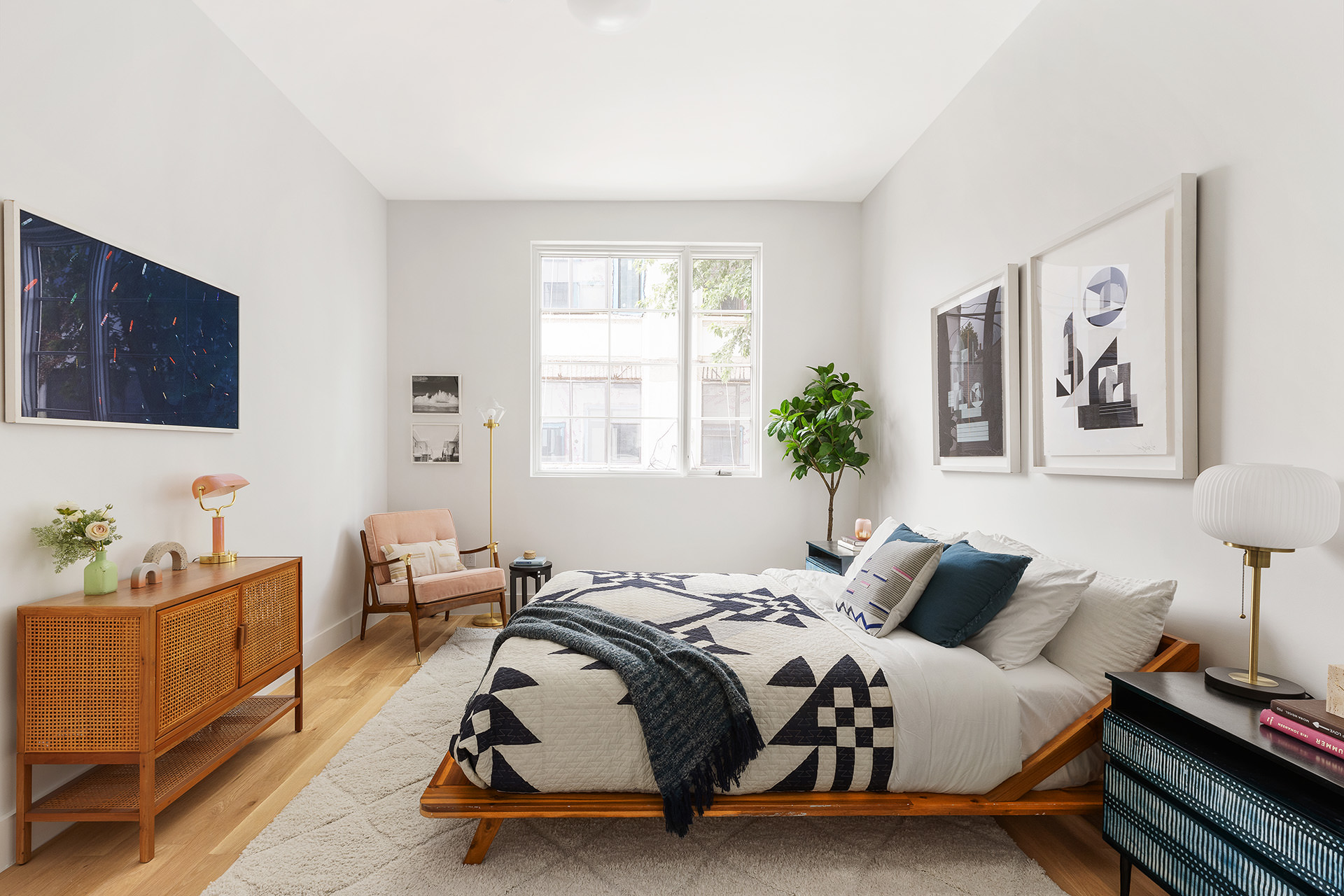 262 17th Street, Unit PH Brooklyn, NY 11215 - Photo 7 of 15 a bedroom with bed couch and window