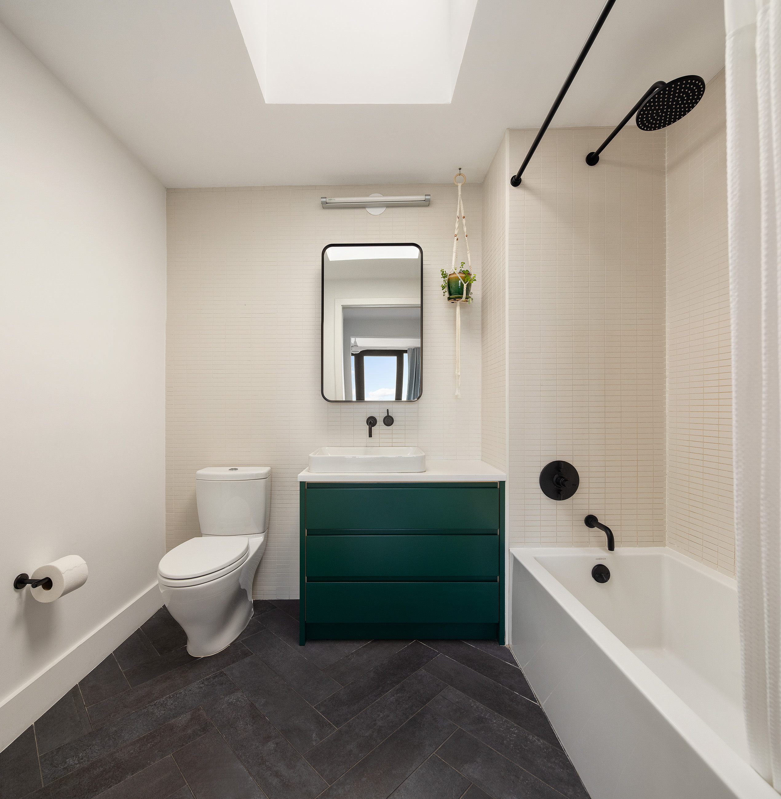 762 Park Place, Unit PH1 Brooklyn, NY 11216 - Photo 5 of 15 a bathroom with a toilet sink and bathtub