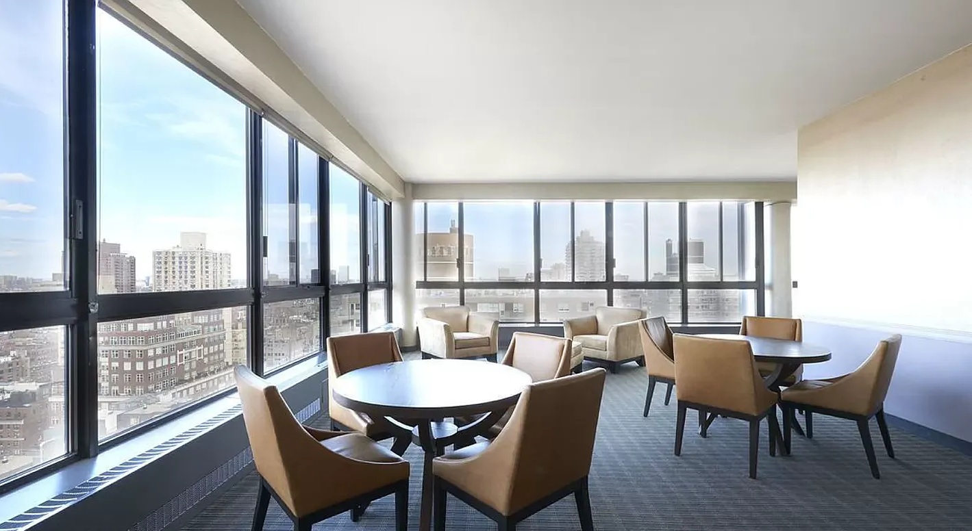 171 East 84th Street, Unit 4B Manhattan, NY 10028 - Photo 17 of 20 a view of a dining room with furniture and window