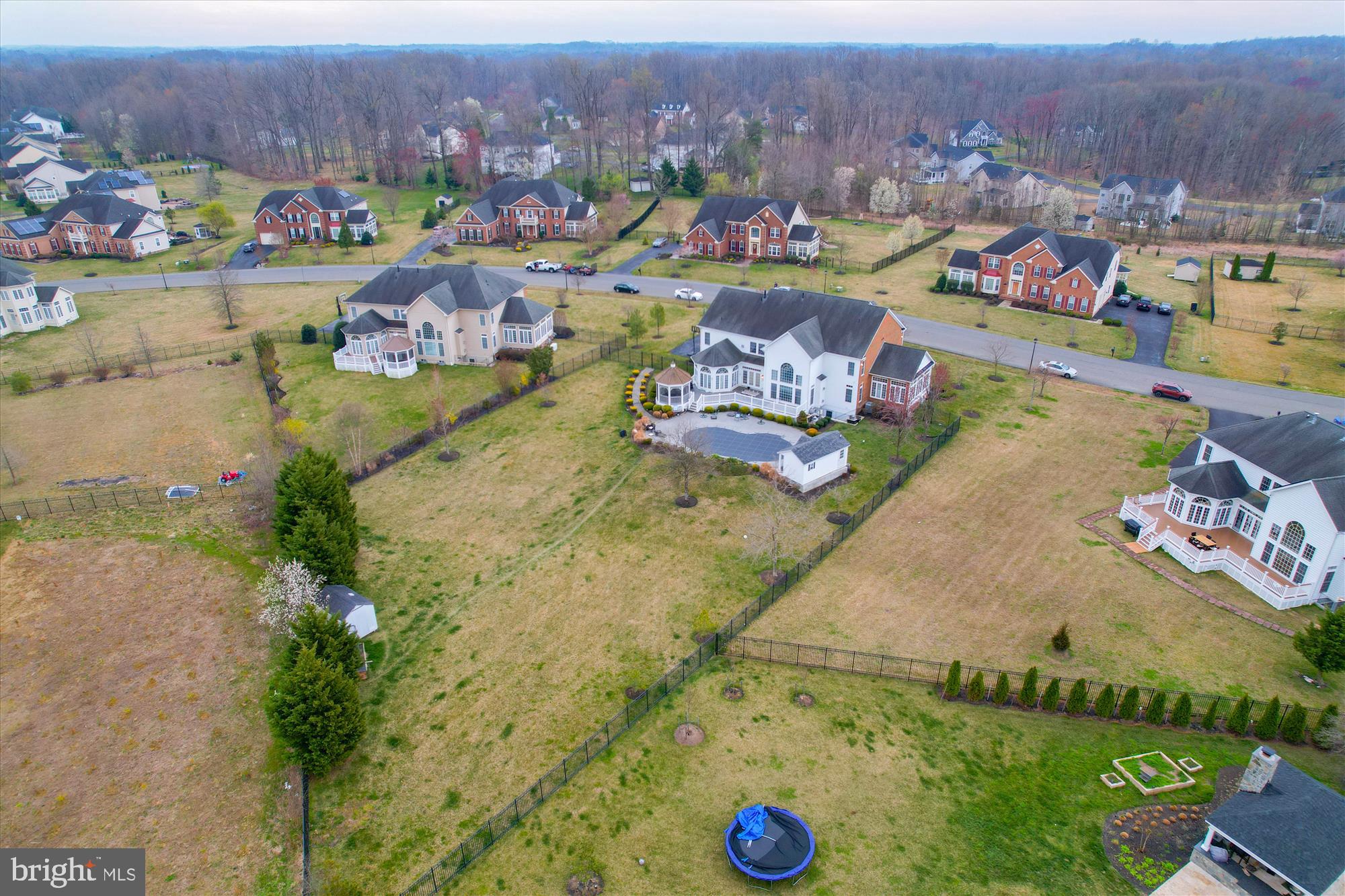 14302 Derby Ridge Road Bowie, MD 20721 - Photo 62 of 67 an aerial view of a house with a swimming pool yard and outdoor seating