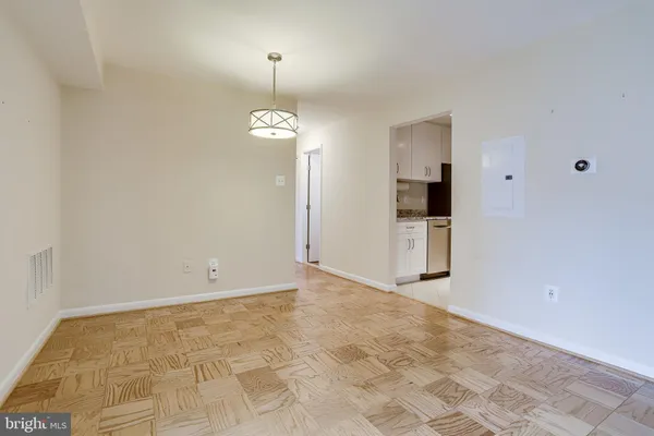 a view of an empty room with a window