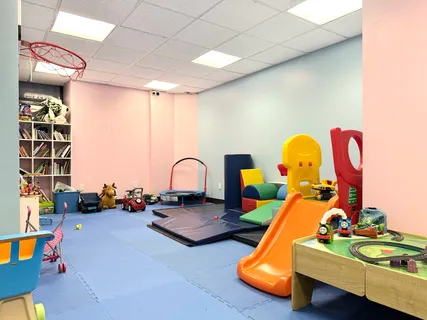 a room with toys and couches