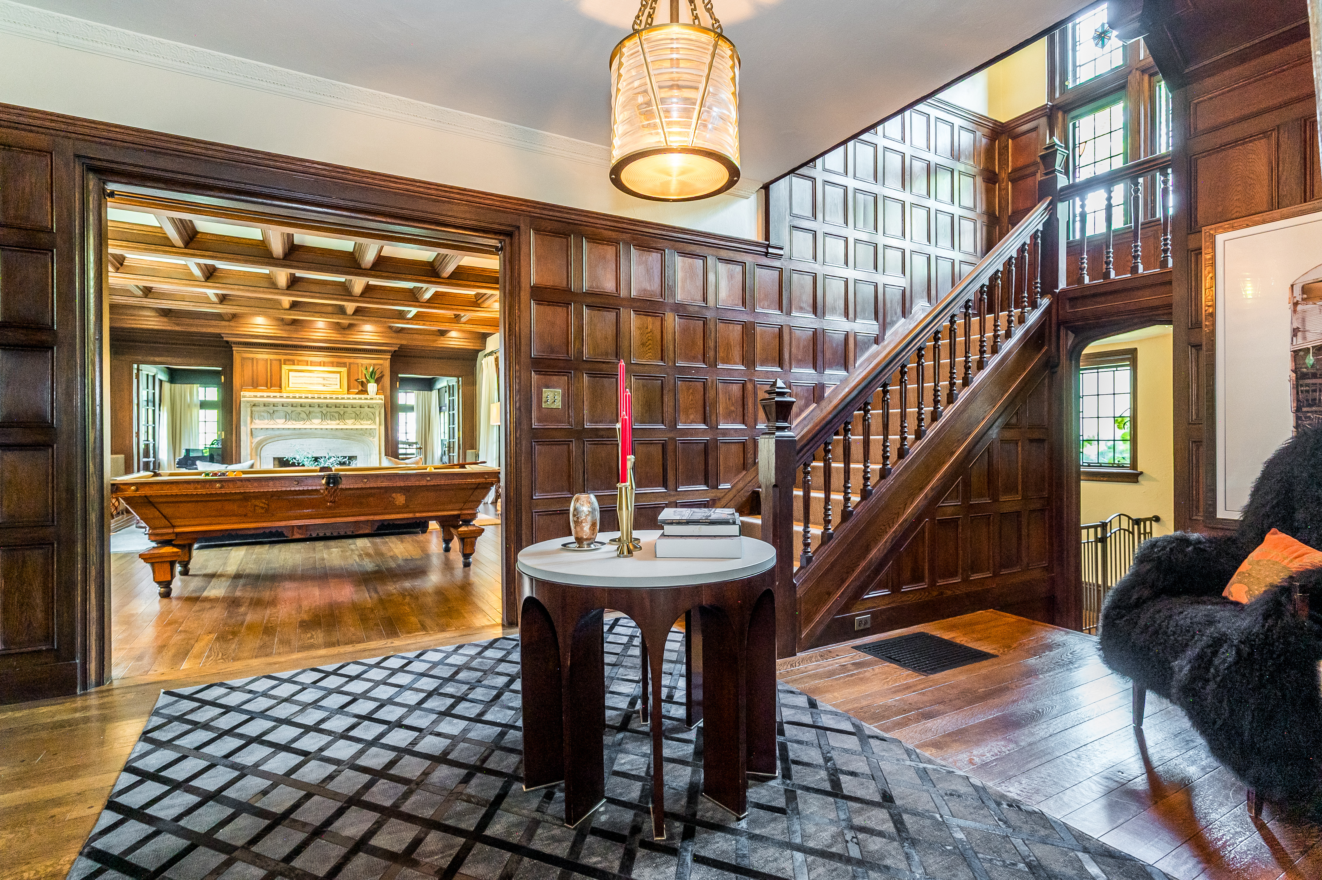 85 Clinton Avenue Montclair, NJ 07042 - Photo 9 of 65 a view of a livingroom with furniture wooden floor and a floor to ceiling window