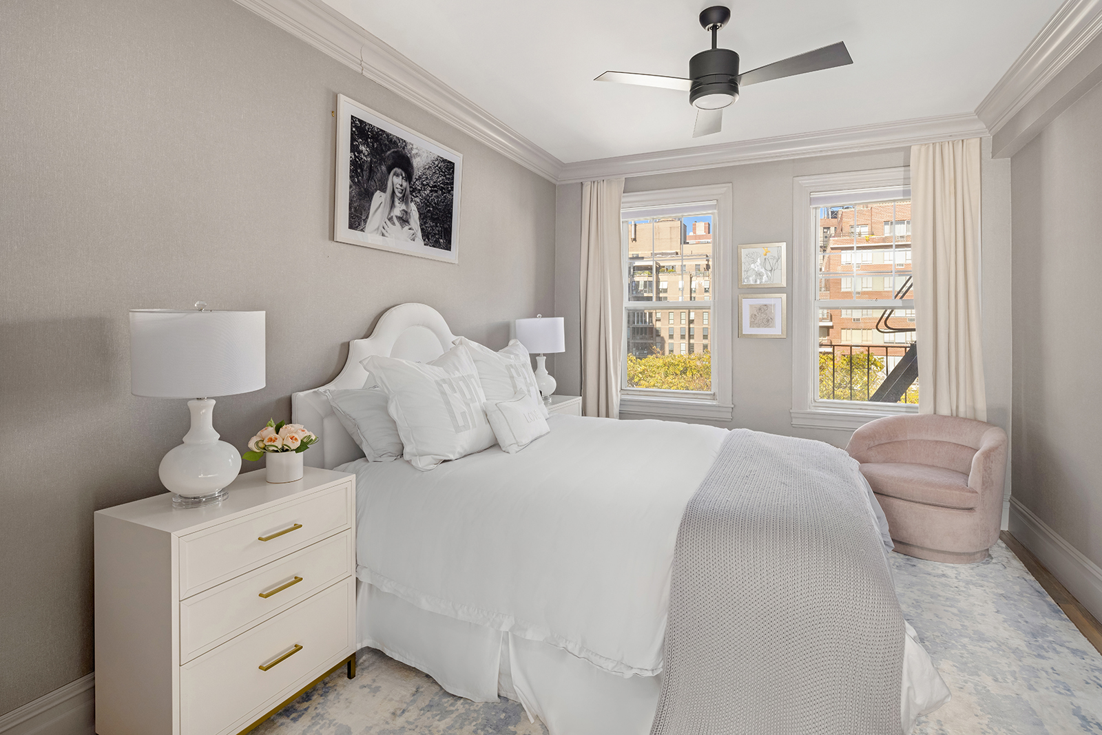 15 West 11th Street, Unit 9A Manhattan, NY 10011 - Photo 3 of 9 a bedroom with a bed and window