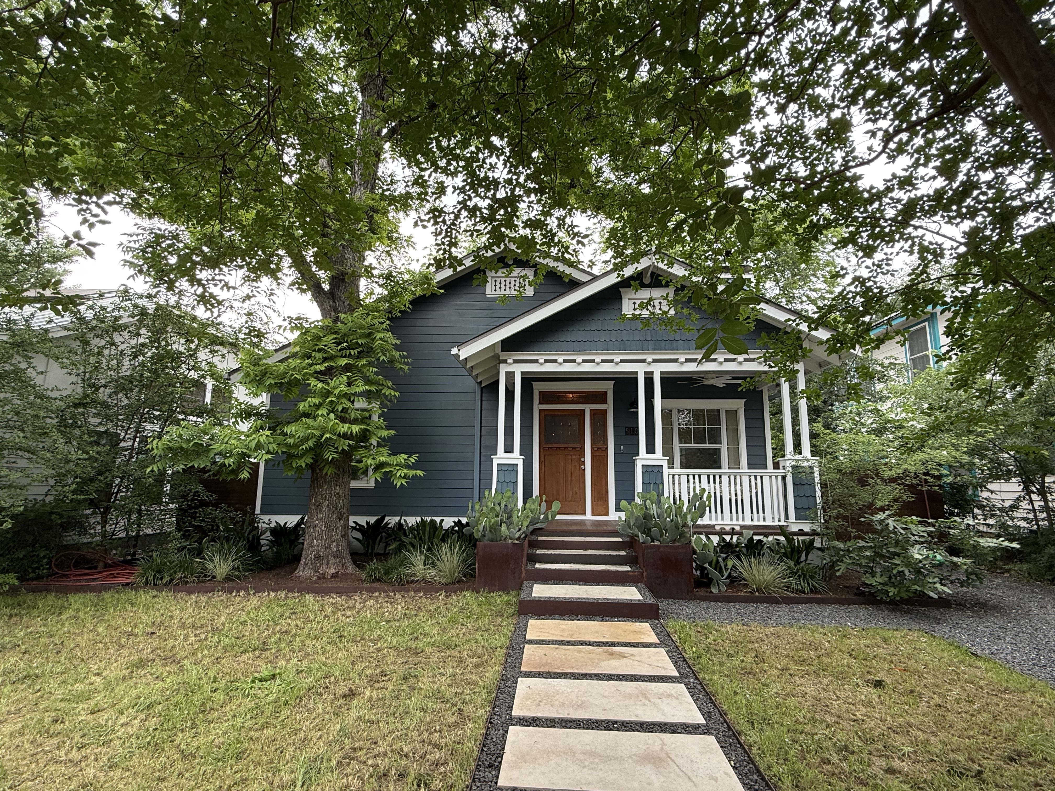 5108 Eilers Avenue Austin, TX 78751 - Photo 1 of 13 a front view of a house with a yard