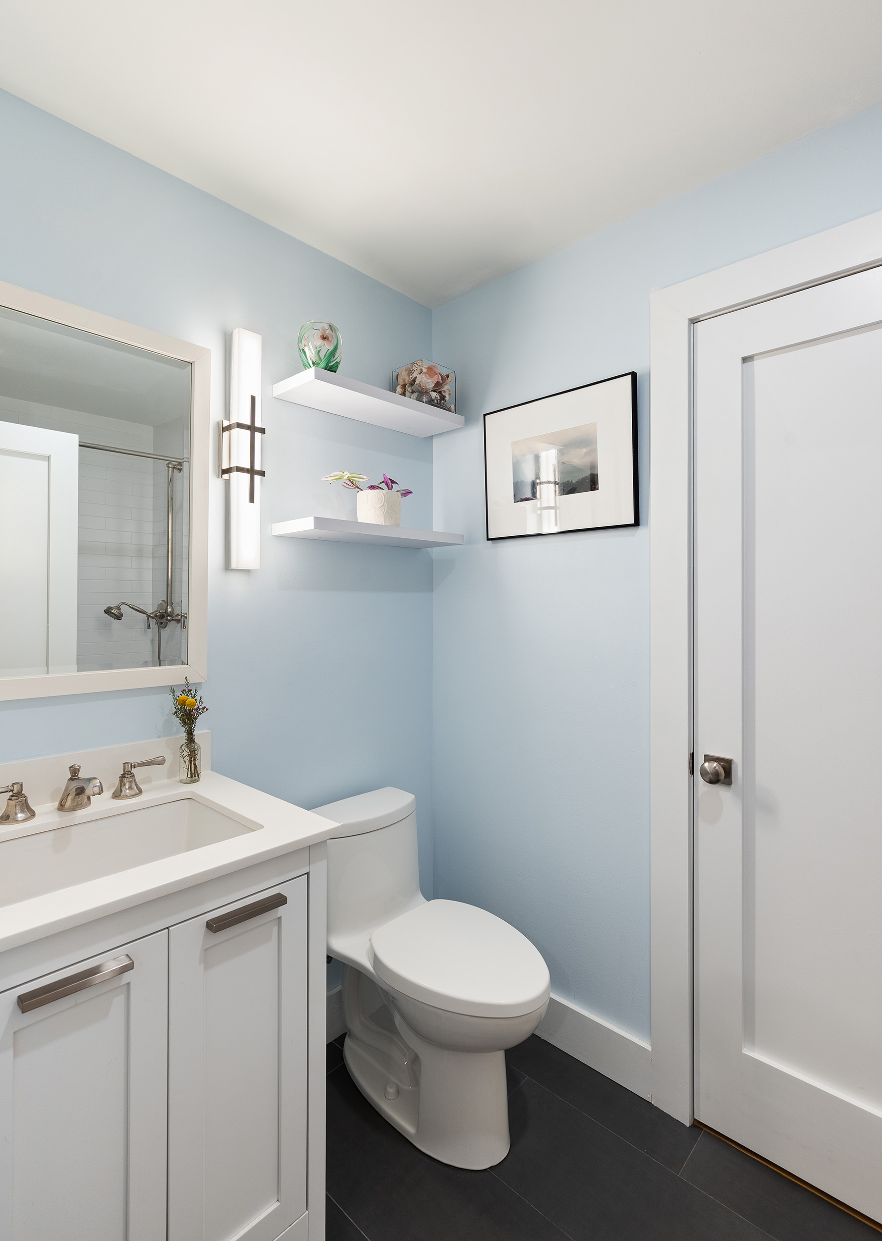 429 Clinton Street, Unit 1 Brooklyn, NY 11231 - Photo 10 of 21 a bathroom with a toilet a sink and mirror