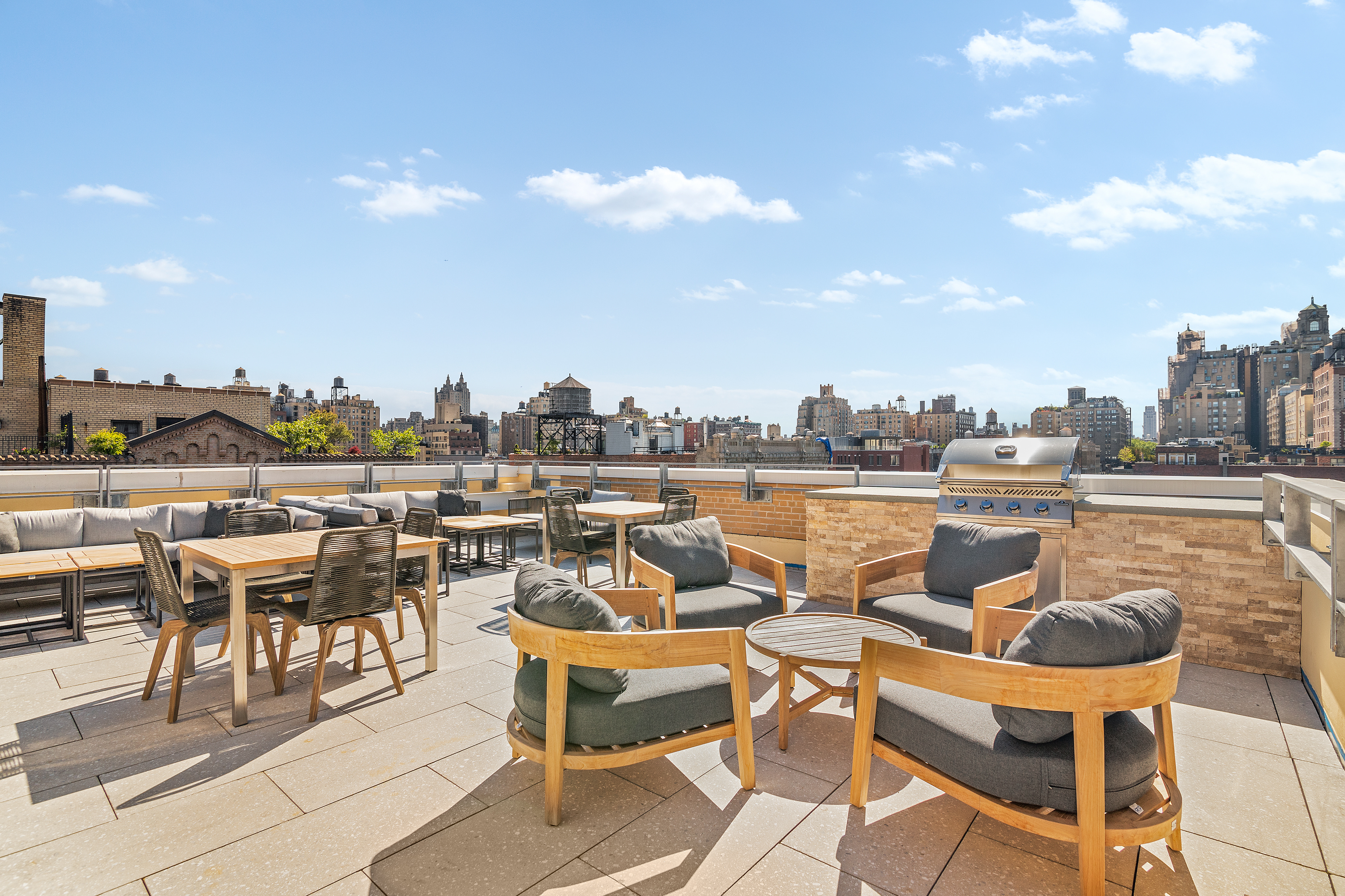 150 West 82nd Street, Unit 7A Manhattan, NY 10024 - Photo 12 of 15 a terrace with outdoor seating city view and barbeque oven