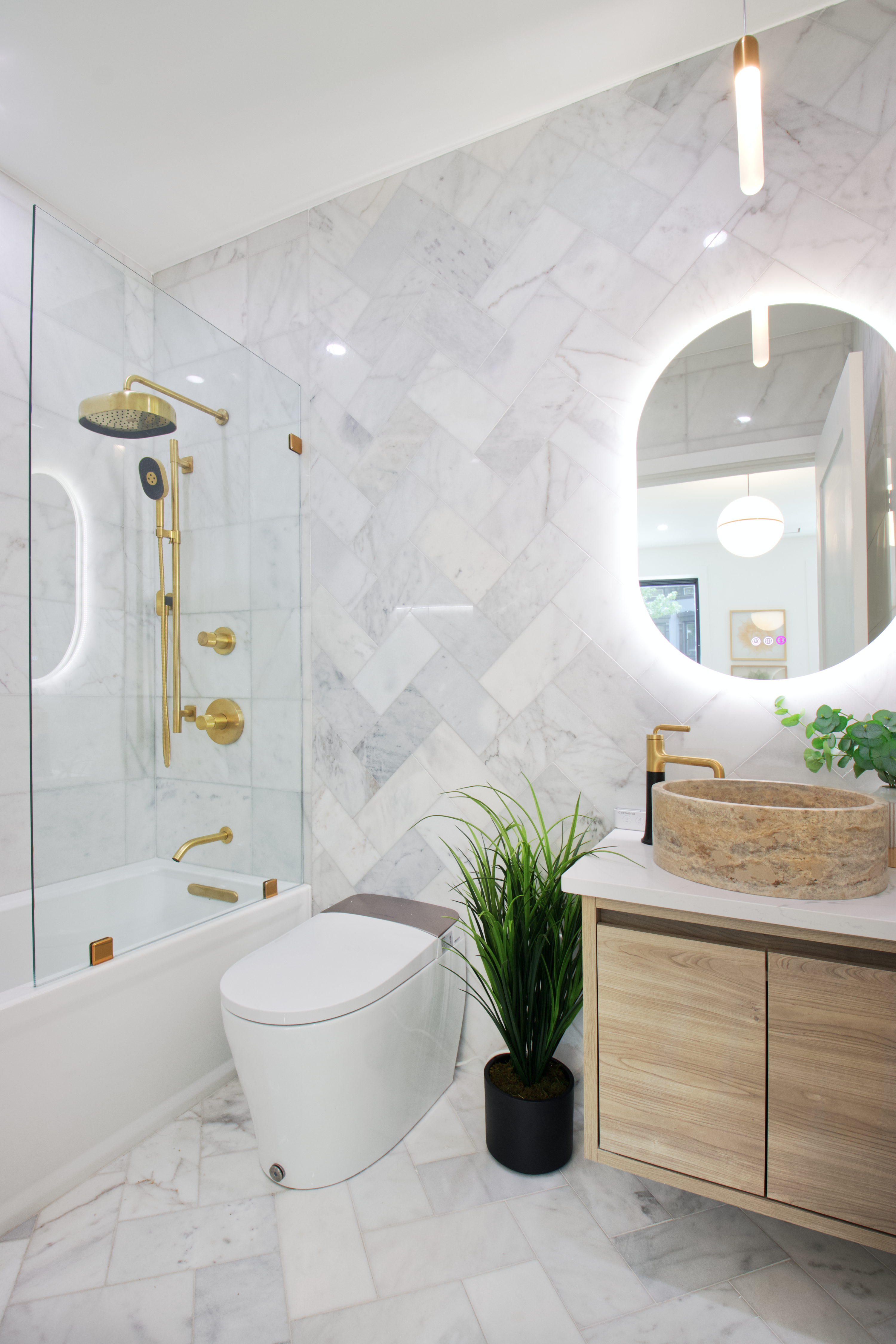 255 Macon Street Brooklyn, NY 11216 - Photo 8 of 36 a bathroom with a potted plant and a bathtub