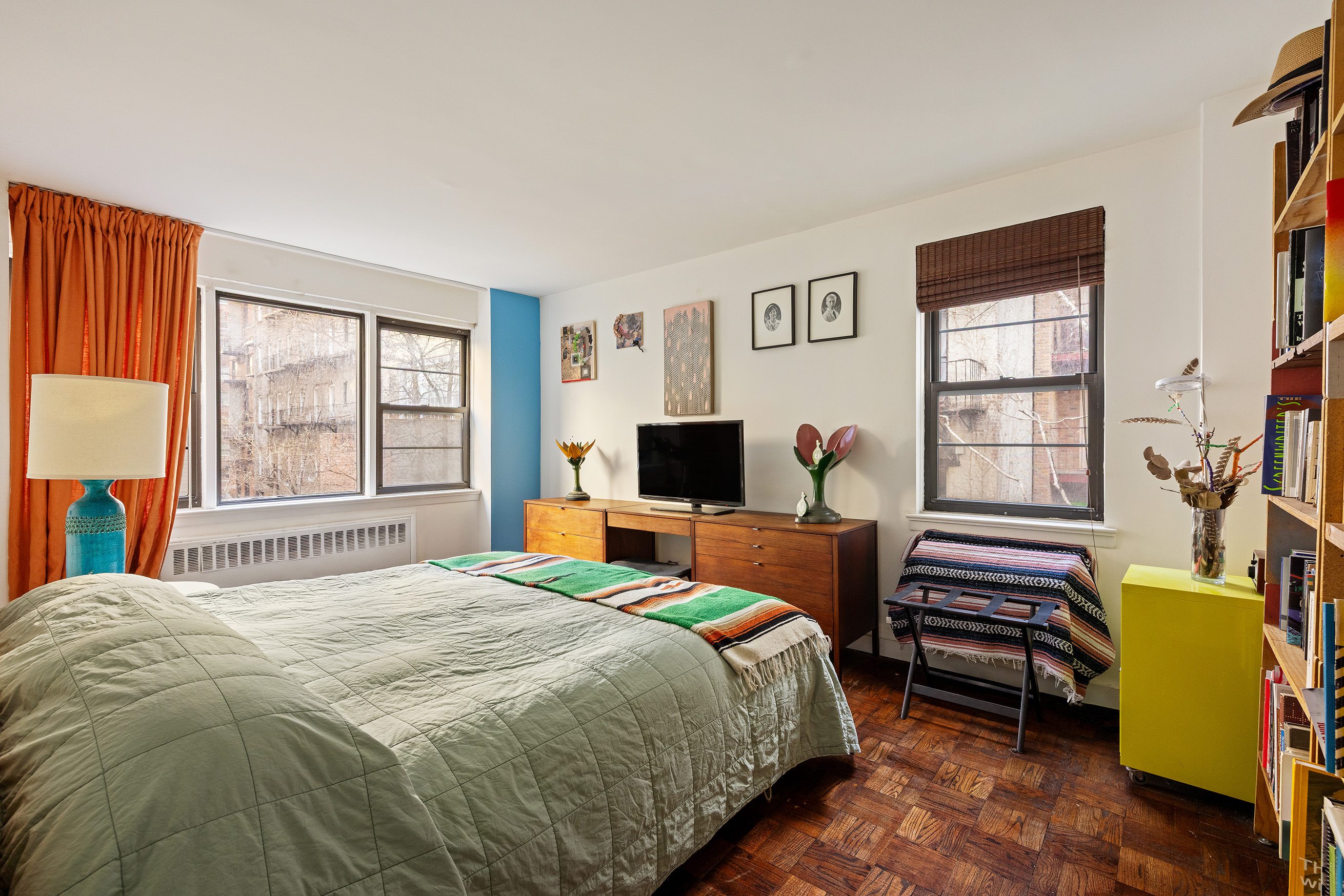 39 Gramercy Park North, Unit 3A Manhattan, NY 10010 - Photo 5 of 8 a bedroom with a bed and a flat screen tv