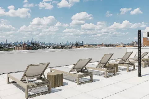 a view of a terrace with seating area