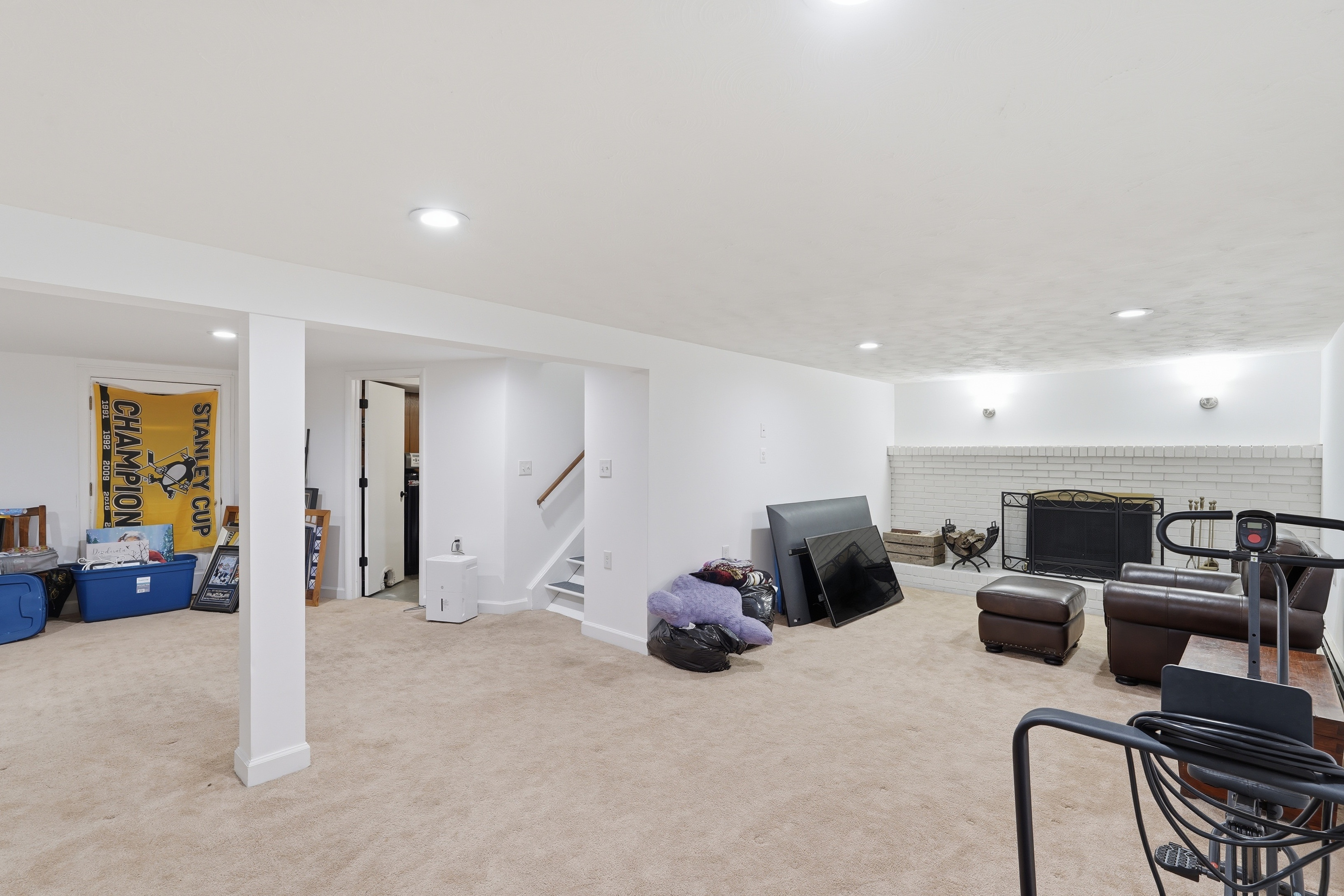 7717 McKaig Road Frederick, MD 21701 - Photo 28 of 53 a living room with furniture and a flat screen tv