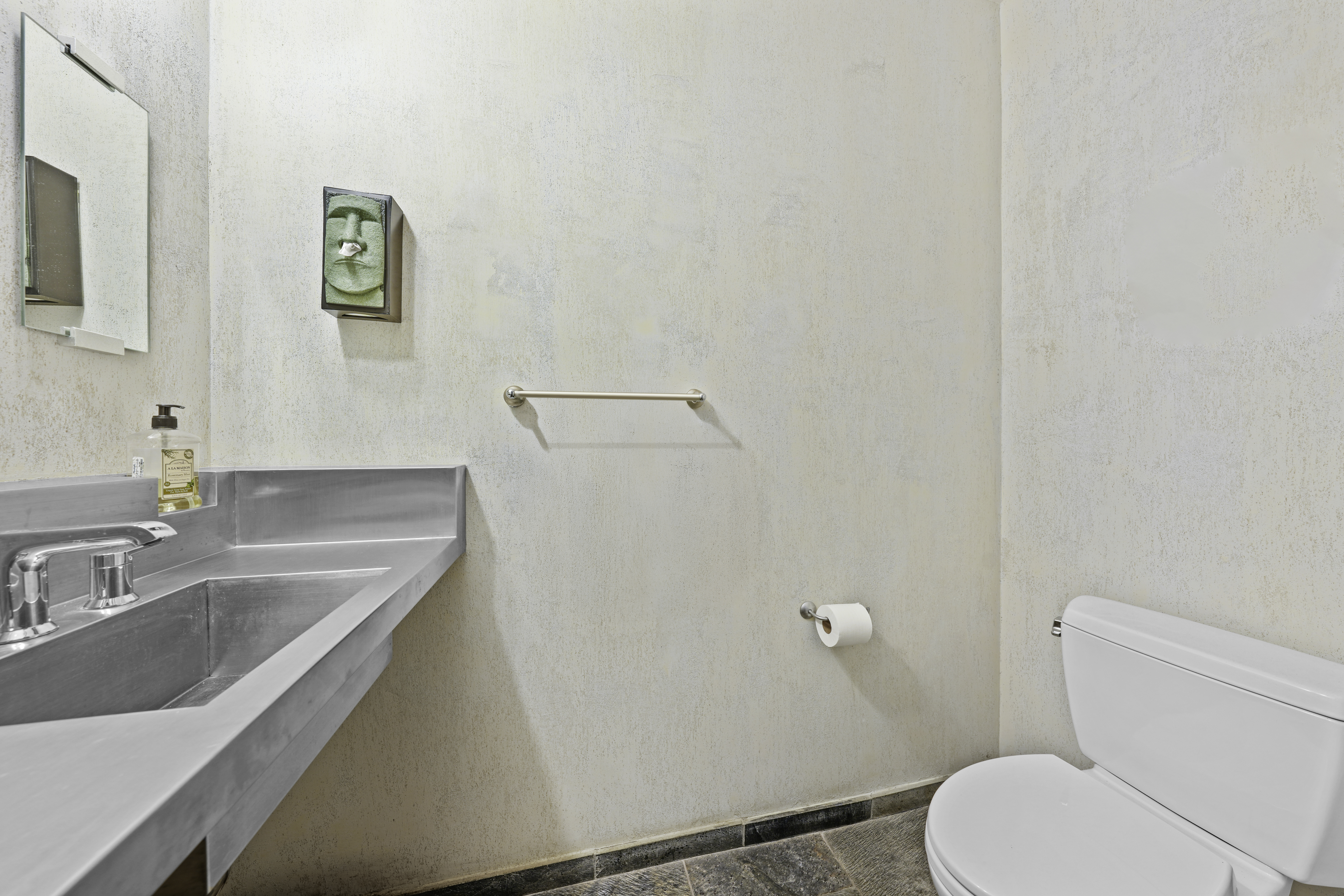 133 West 123rd Street Manhattan, NY 10027 - Photo 25 of 31 a bathroom with a sink a toilet and mirror