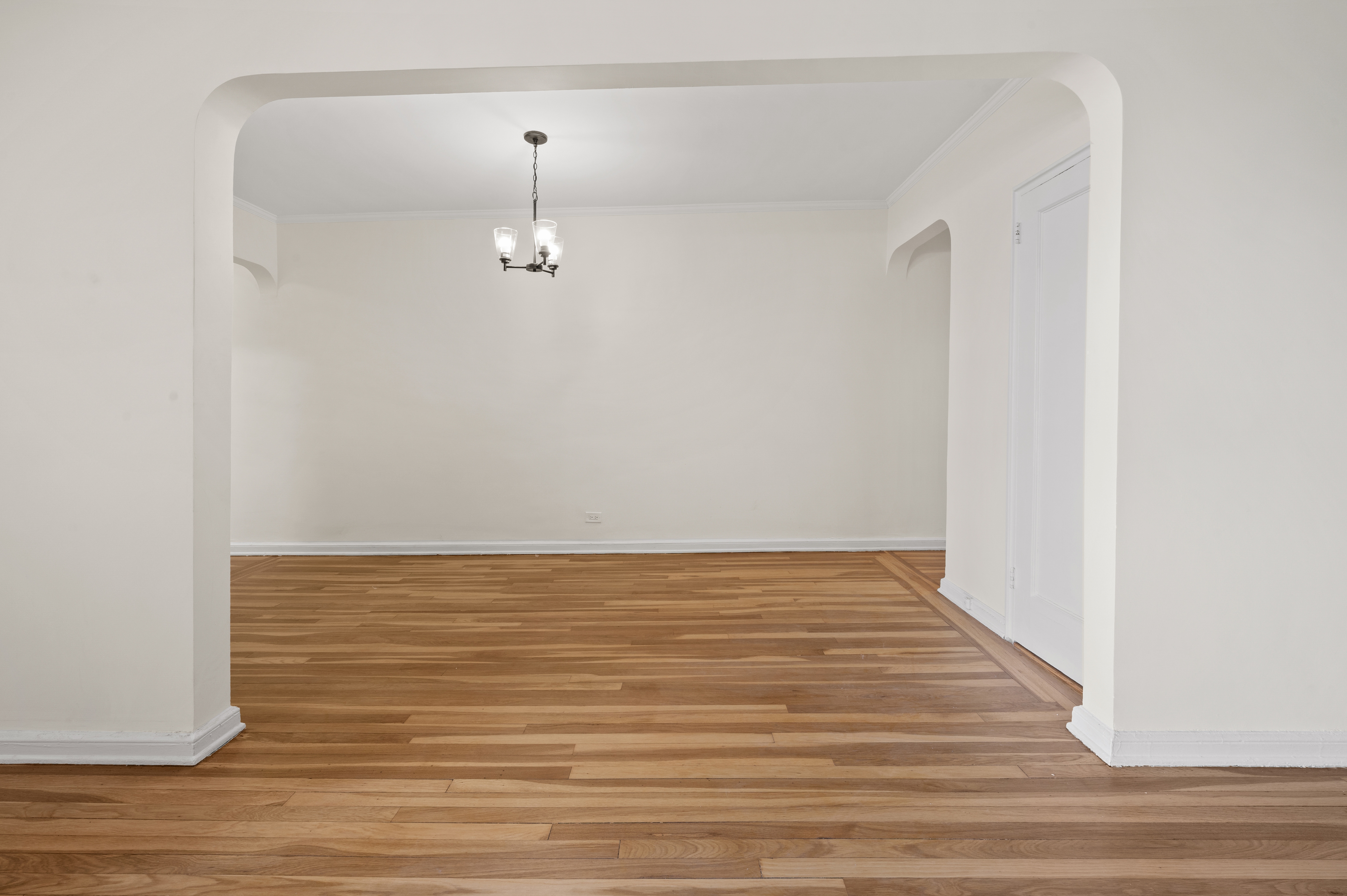 159-34 Riverside Drive West, Unit 3D Manhattan, NY 10032 - Photo 7 of 12 a view of a room with wooden floor