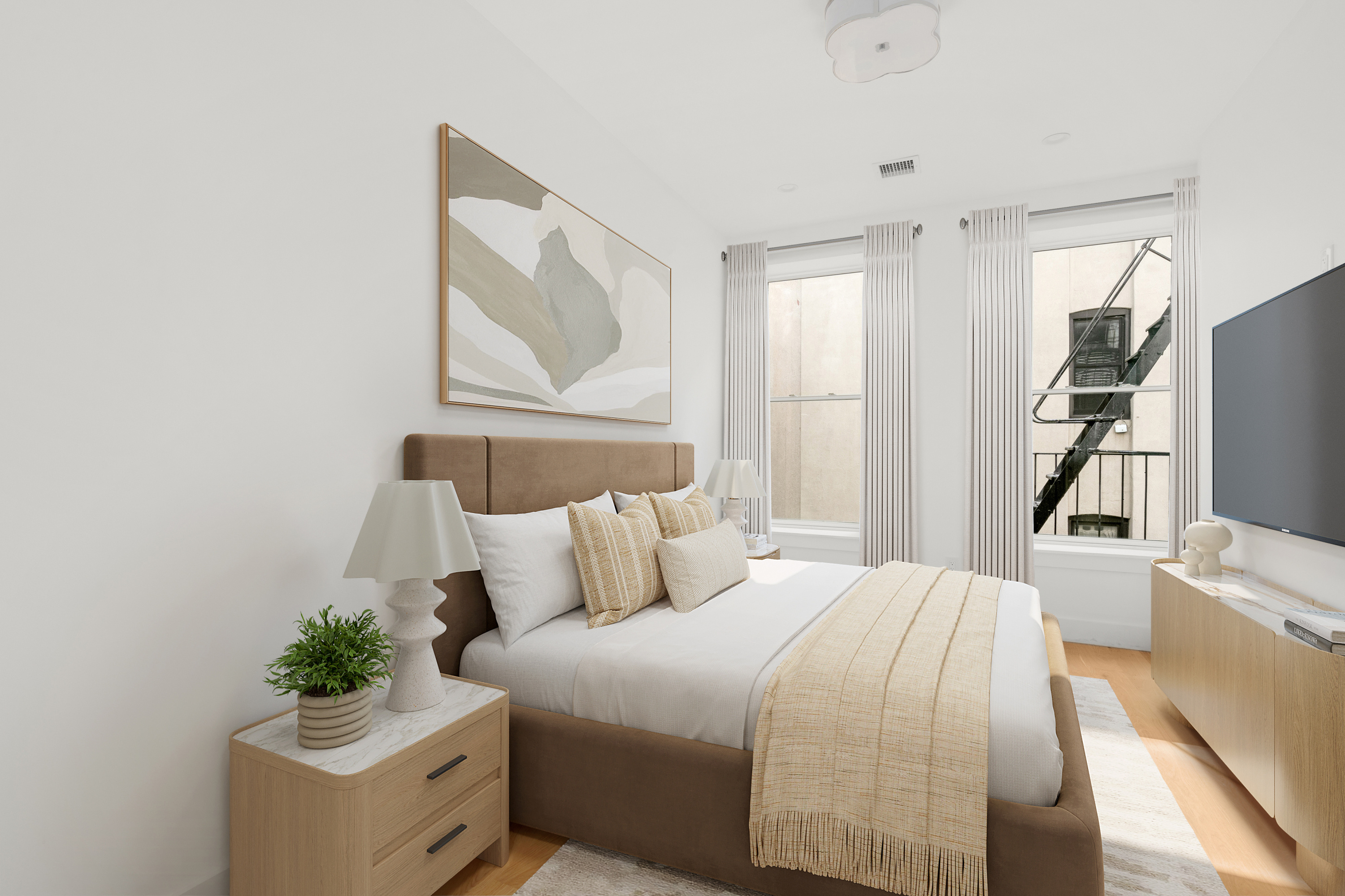 347 6th Avenue, Unit 1 Brooklyn, NY 11215 - Photo 5 of 15 a bedroom with a bed and a couch