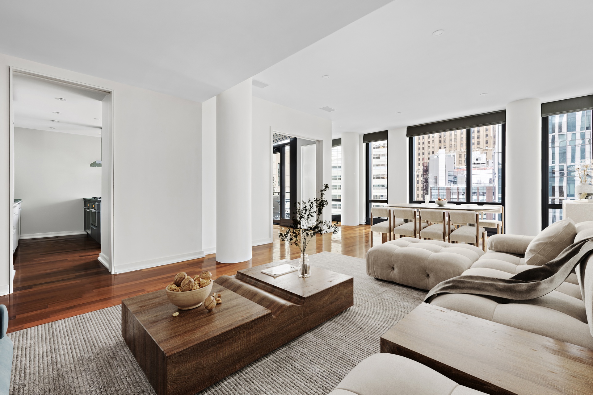 101 Warren Street, Unit 11L Manhattan, NY 10007 - Photo 2 of 26 a living room with furniture and floor to ceiling window