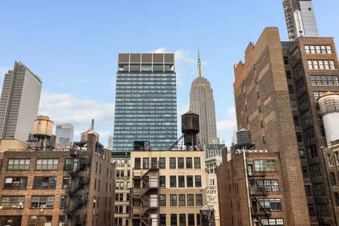 a view of a city with tall buildings