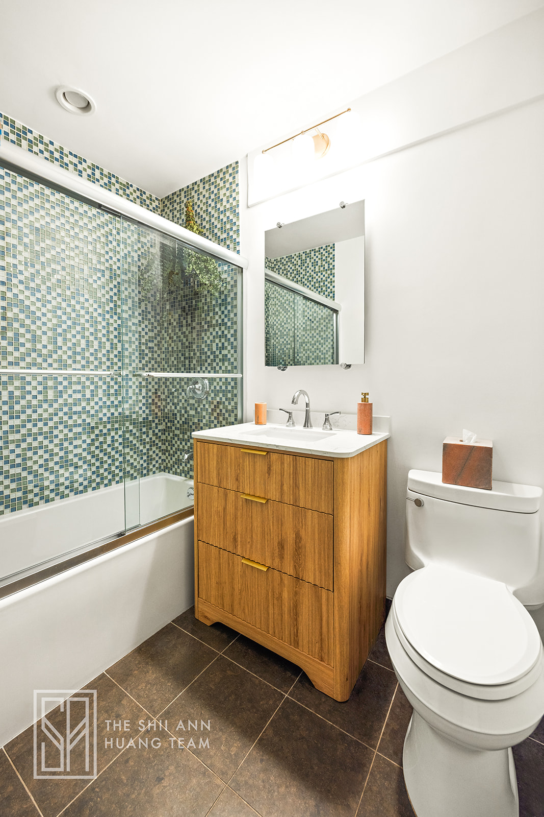 10 8th Avenue, Unit 2 Brooklyn, NY 11217 - Photo 14 of 18 a bathroom with a sink mirror vanity and toilet