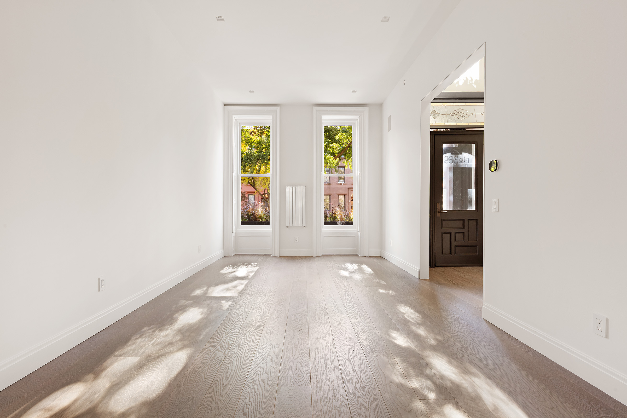 369 Union Street Brooklyn, NY 11231 - Photo 2 of 21 an empty room with windows and entrance