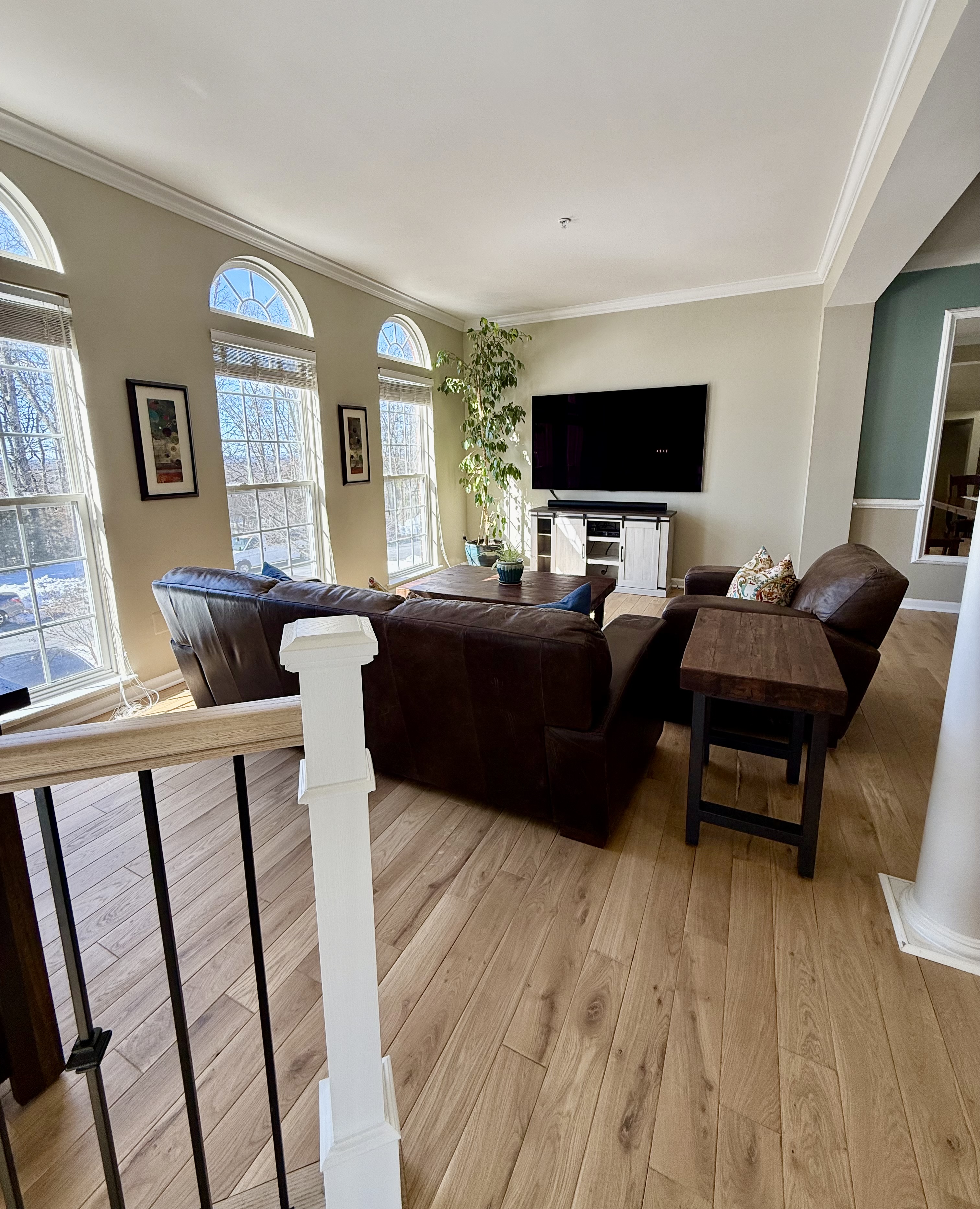 Address Upon Request Leesburg, VA 20176 - Photo 5 of 55 a living room with furniture and a flat screen tv