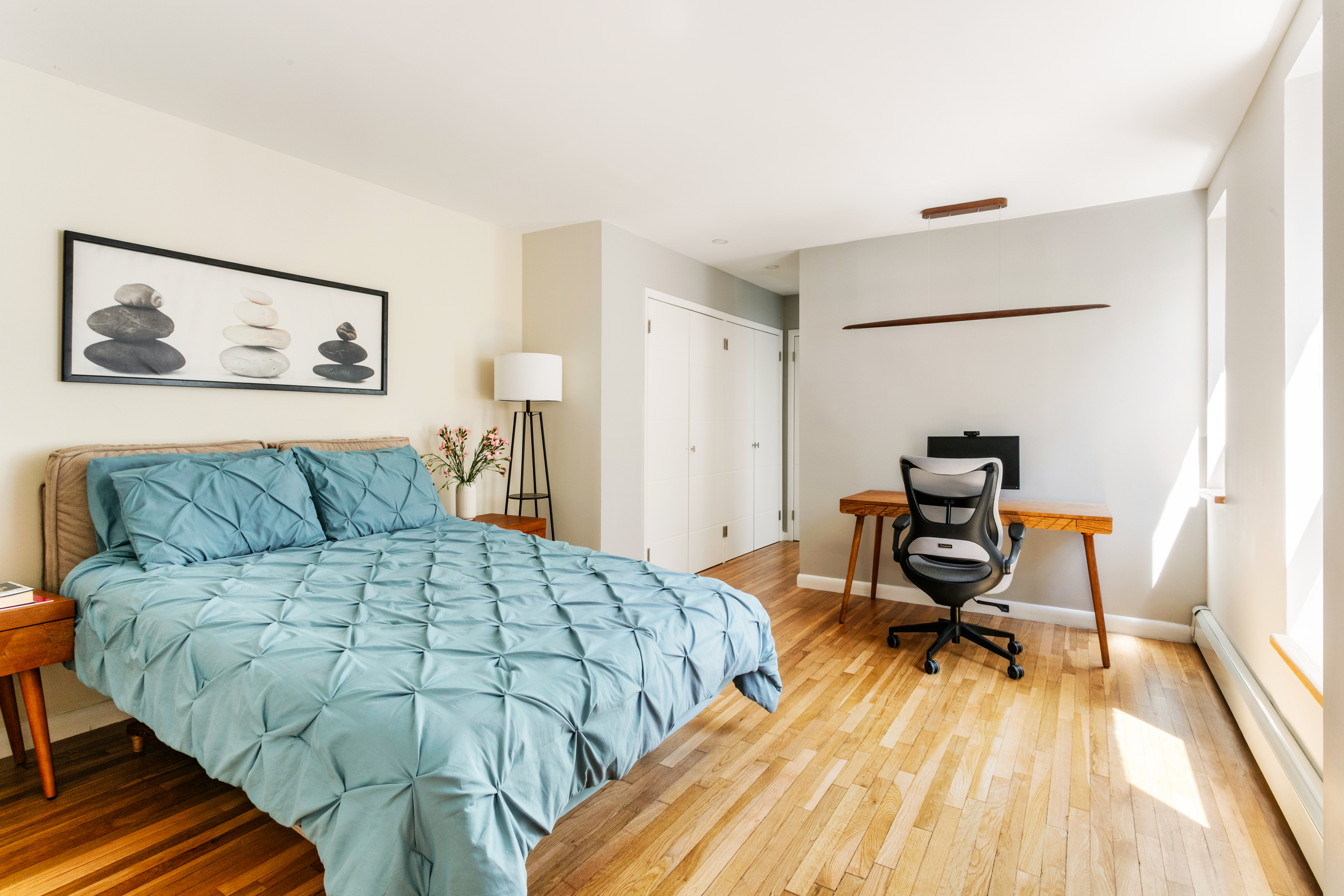 317 West 95th Street, Unit 6F Manhattan, NY 10025 - Photo 6 of 11 a bedroom with a bed and a table