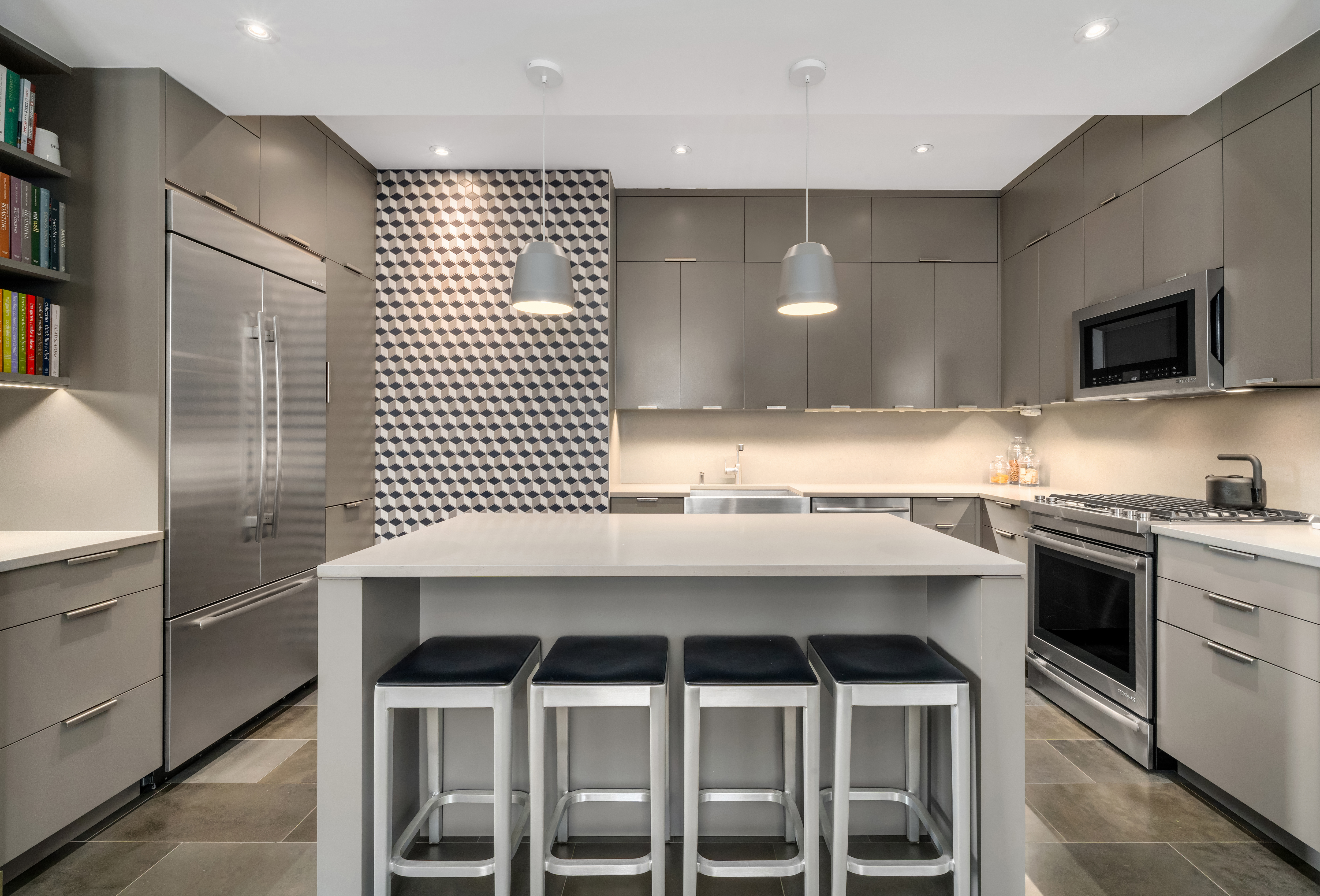 252 7th Avenue, Unit 9D Manhattan, NY 10001 - Photo 9 of 23 a kitchen with a sink cabinets and window