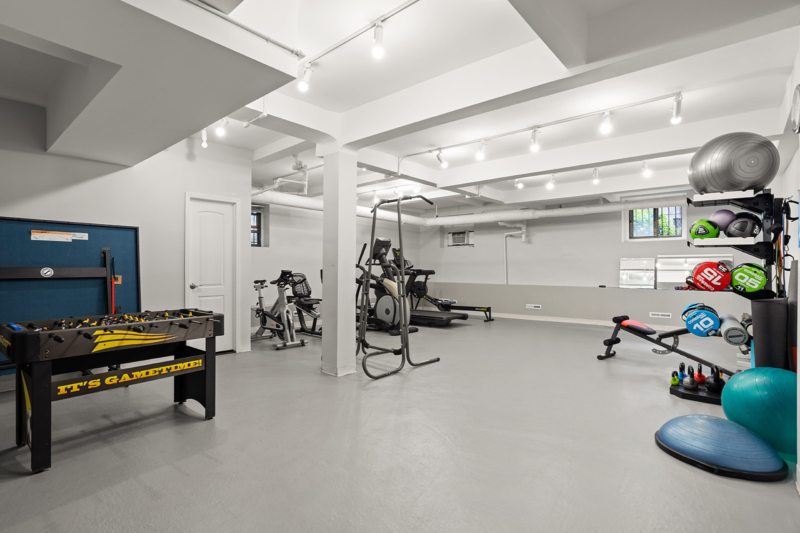 35-36 76th Street, Unit 123 Queens, NY 11372 - Photo 10 of 11 a view of a room with gym equipment